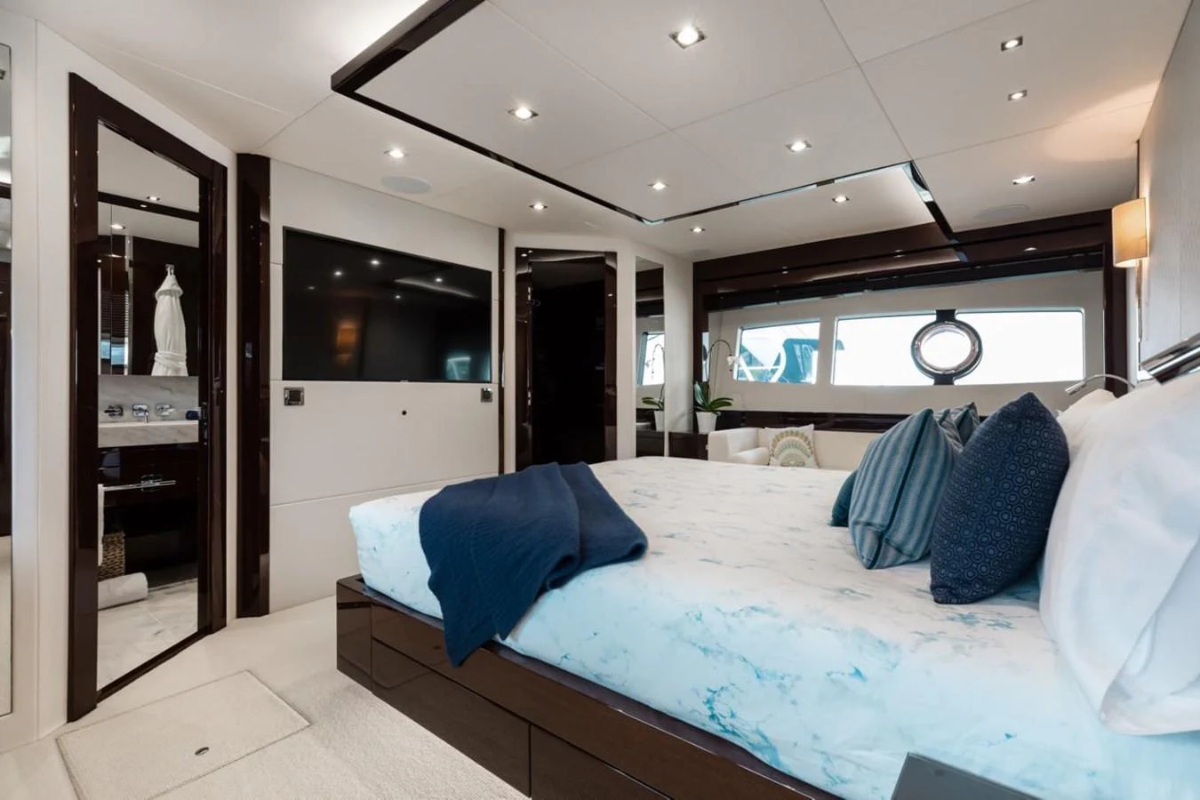 The master stateroom offers a luxurious and spacious retreat with modern amenities and elegant decor. aboard 95 FT 2018 SUNSEEKER 95 YACHT, MIRRACLE Yacht for Sale