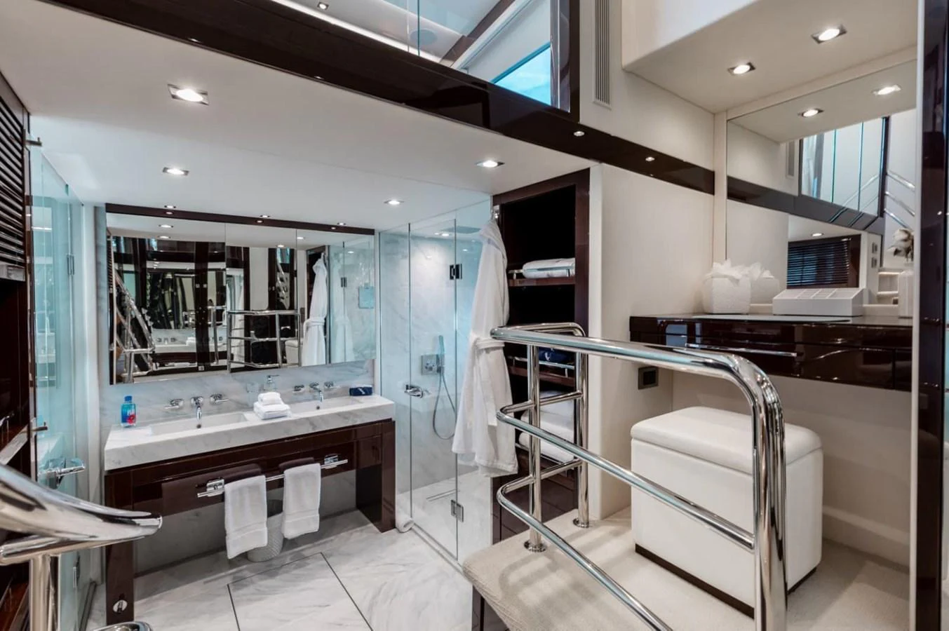 The yacht's bathroom features a luxurious and modern design with high-end fixtures and ample space. aboard 95 FT 2018 SUNSEEKER 95 YACHT, MIRRACLE Yacht for Sale