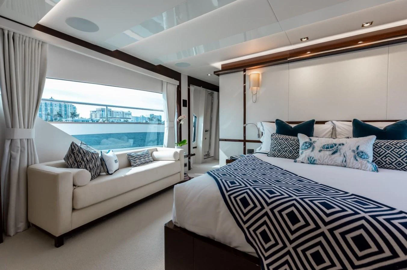 The master stateroom offers a luxurious and spacious retreat with elegant decor and ample natural light. aboard 95 FT 2018 SUNSEEKER 95 YACHT, MIRRACLE Yacht for Sale