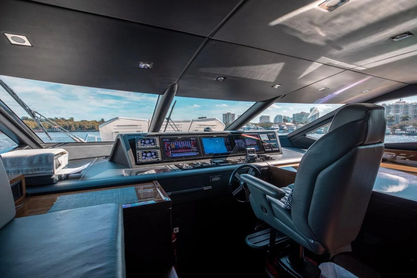 The helm station offers a commanding view with state-of-the-art navigation equipment and luxurious seating. aboard 95 FT 2018 SUNSEEKER 95 YACHT, MIRRACLE Yacht for Sale