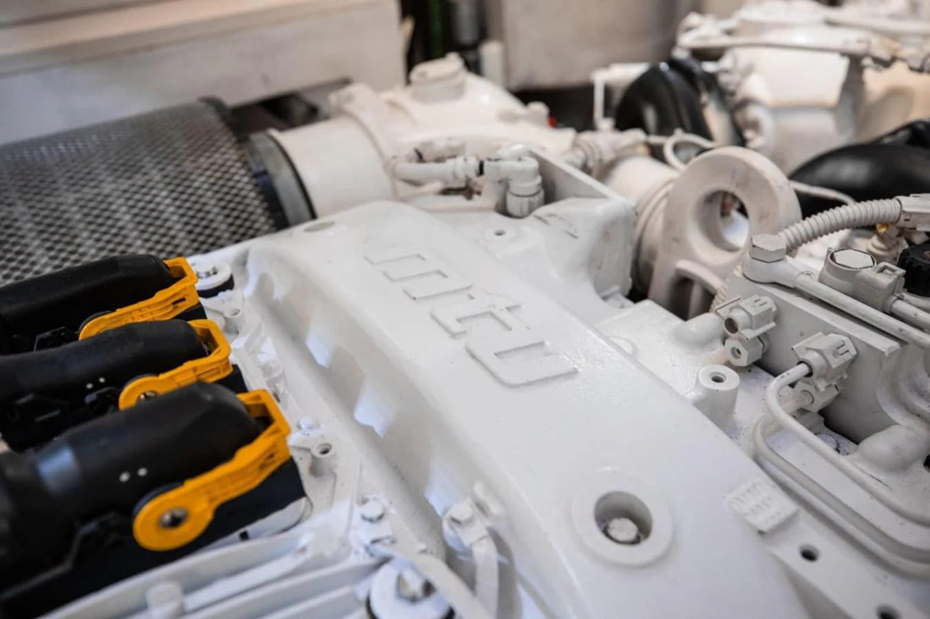 A close-up view of the yacht's engine showcasing its intricate components and engineering. aboard 95 FT 2018 SUNSEEKER 95 YACHT, MIRRACLE Yacht for Sale