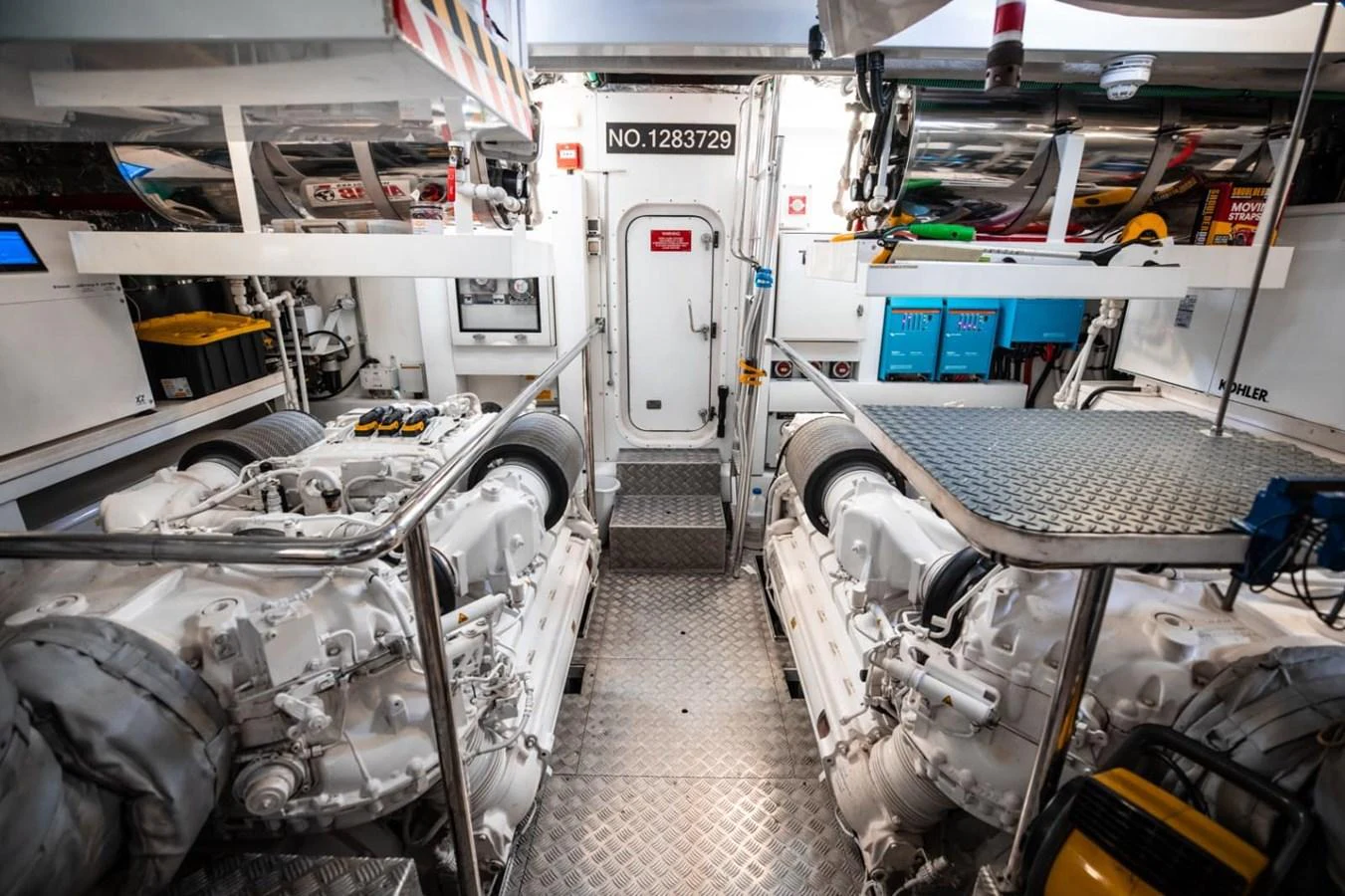 The engine room showcases powerful machinery and a well-organized layout. aboard 95 FT 2018 SUNSEEKER 95 YACHT, MIRRACLE Yacht for Sale