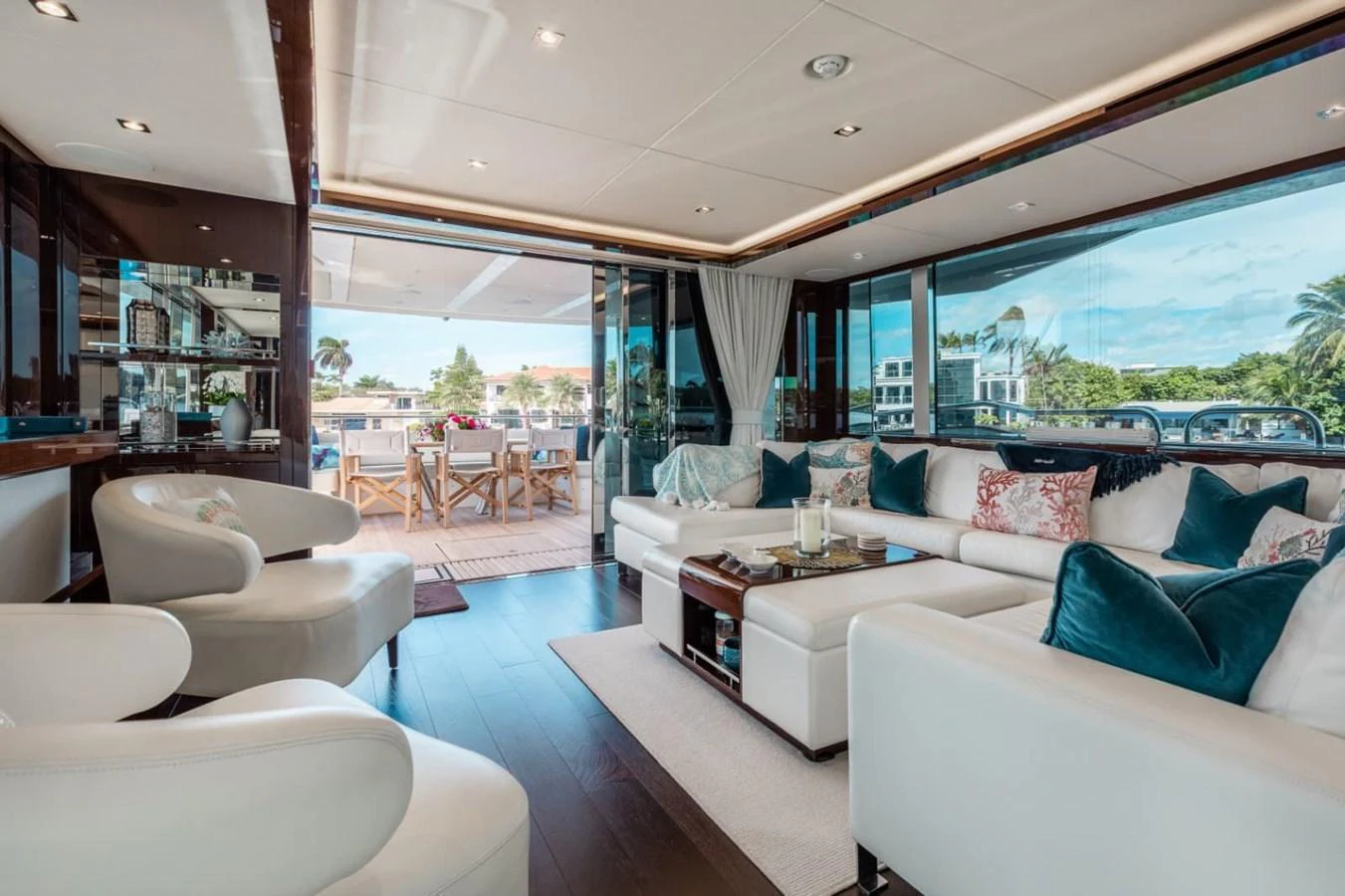 The spacious salon features luxurious seating with a view of the aft deck and beyond. aboard 95 FT 2018 SUNSEEKER 95 YACHT, MIRRACLE Yacht for Sale