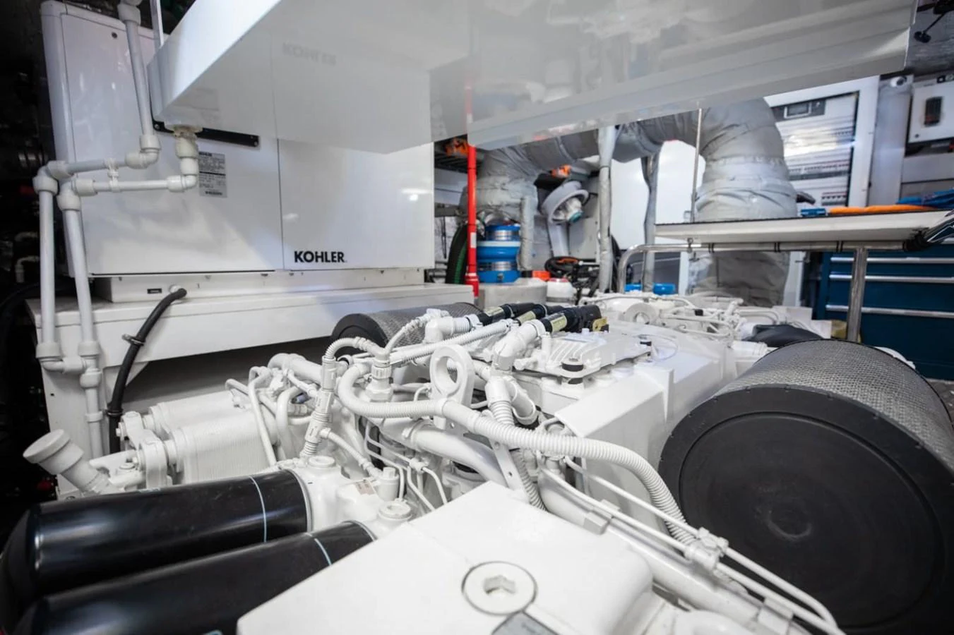 The image showcases the yacht's engine room with visible machinery and equipment. aboard 95 FT 2018 SUNSEEKER 95 YACHT, MIRRACLE Yacht for Sale