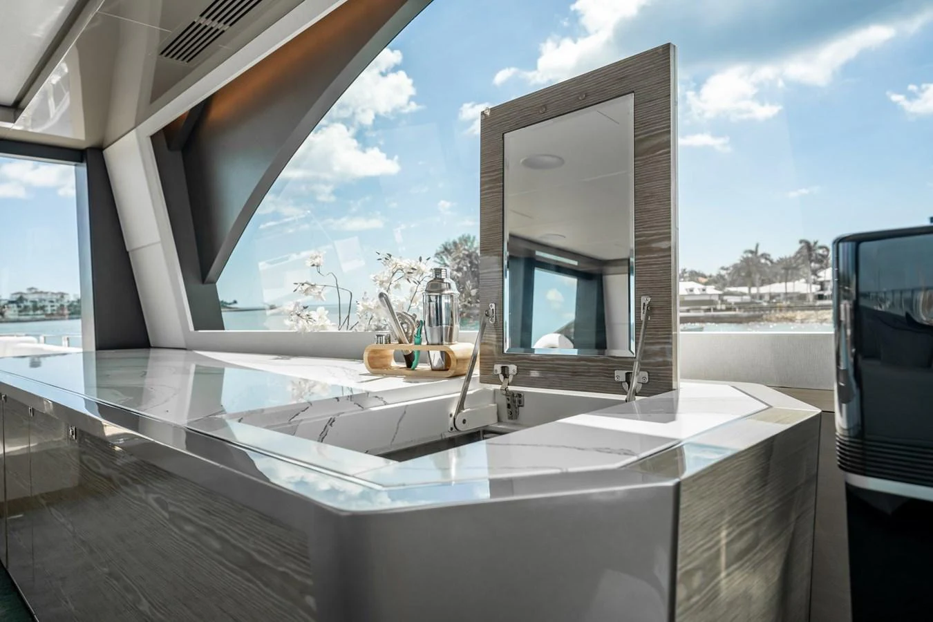 The sleek and modern galley offers a stylish and functional space with a beautiful view. aboard AQUASITION Yacht for Sale