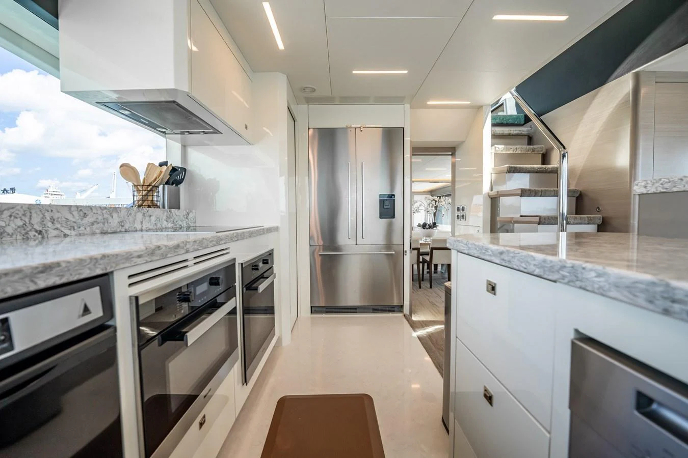 The galley features modern appliances and sleek countertops, offering a stylish and functional space for culinary activities. aboard AQUASITION Yacht for Sale