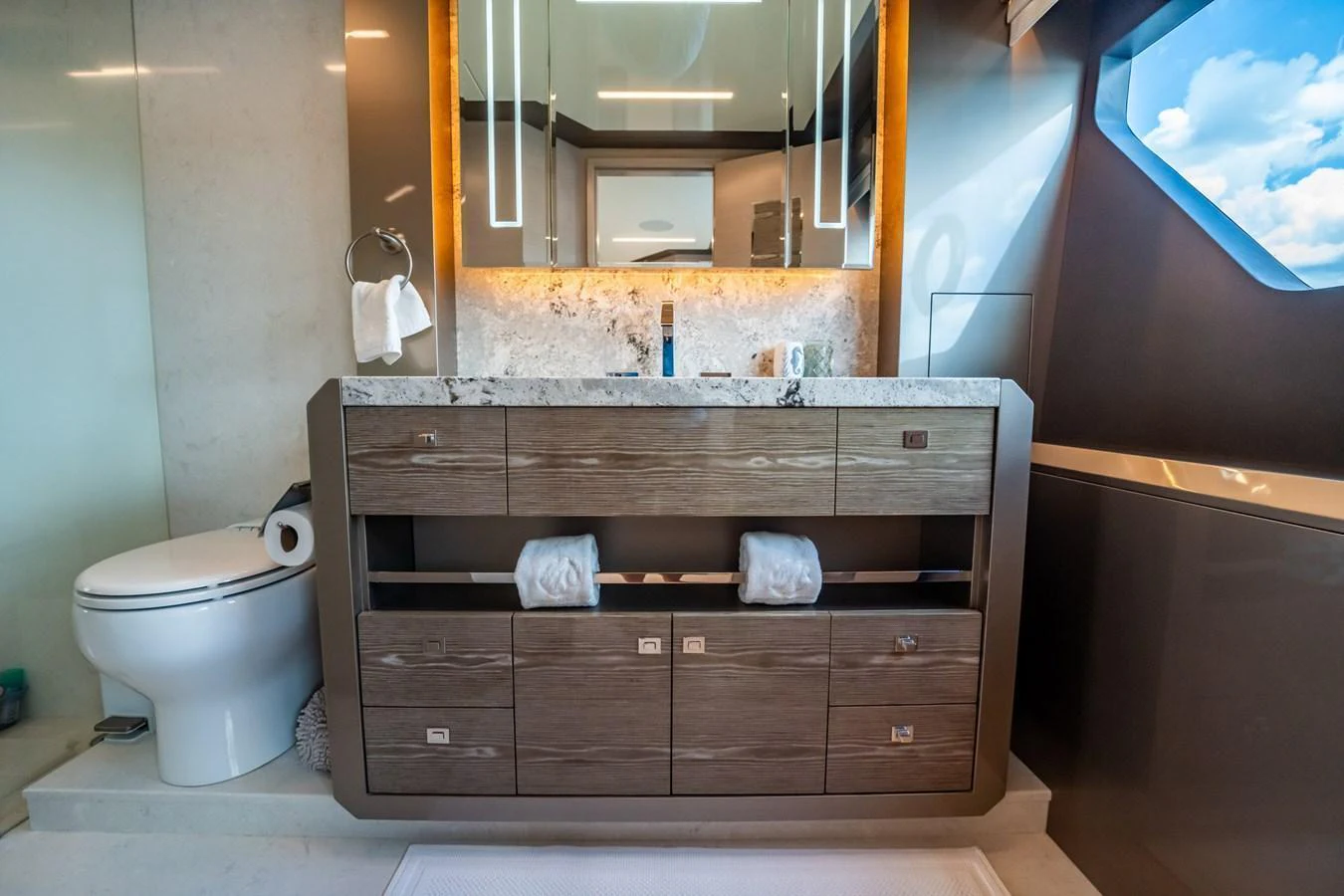 A luxurious yacht bathroom featuring modern fixtures and elegant design. aboard AQUASITION Yacht for Sale