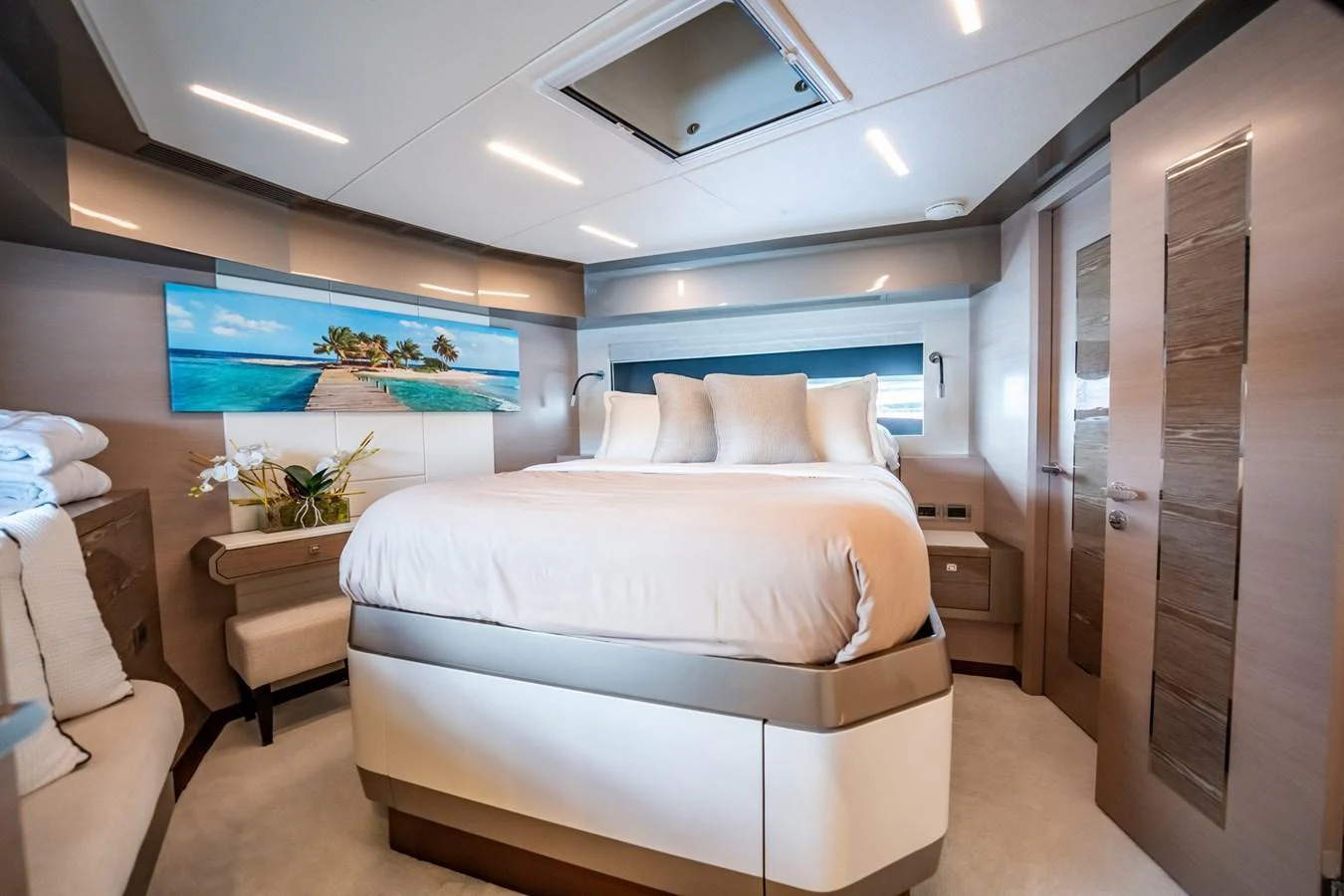 The stateroom offers a luxurious and serene retreat with modern decor and ample natural light. aboard AQUASITION Yacht for Sale