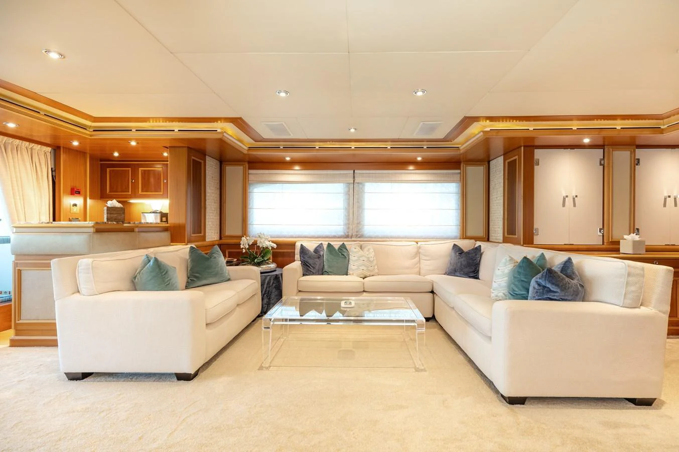 The salon features plush seating and elegant decor, creating a welcoming and luxurious atmosphere. aboard EMOTION 2 Yacht for Sale