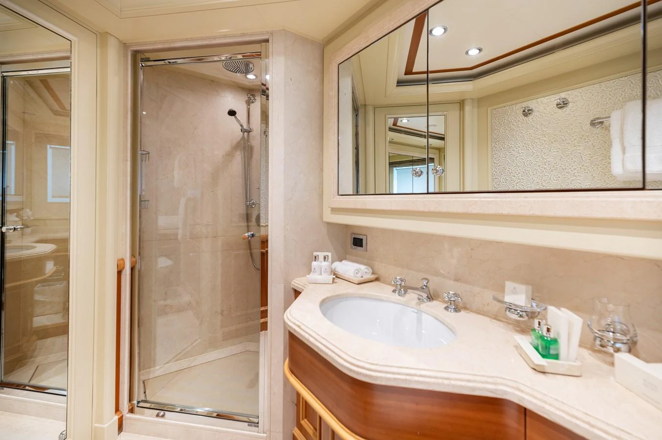 The yacht's bathroom features elegant fixtures and a spacious shower. aboard EMOTION 2 Yacht for Sale