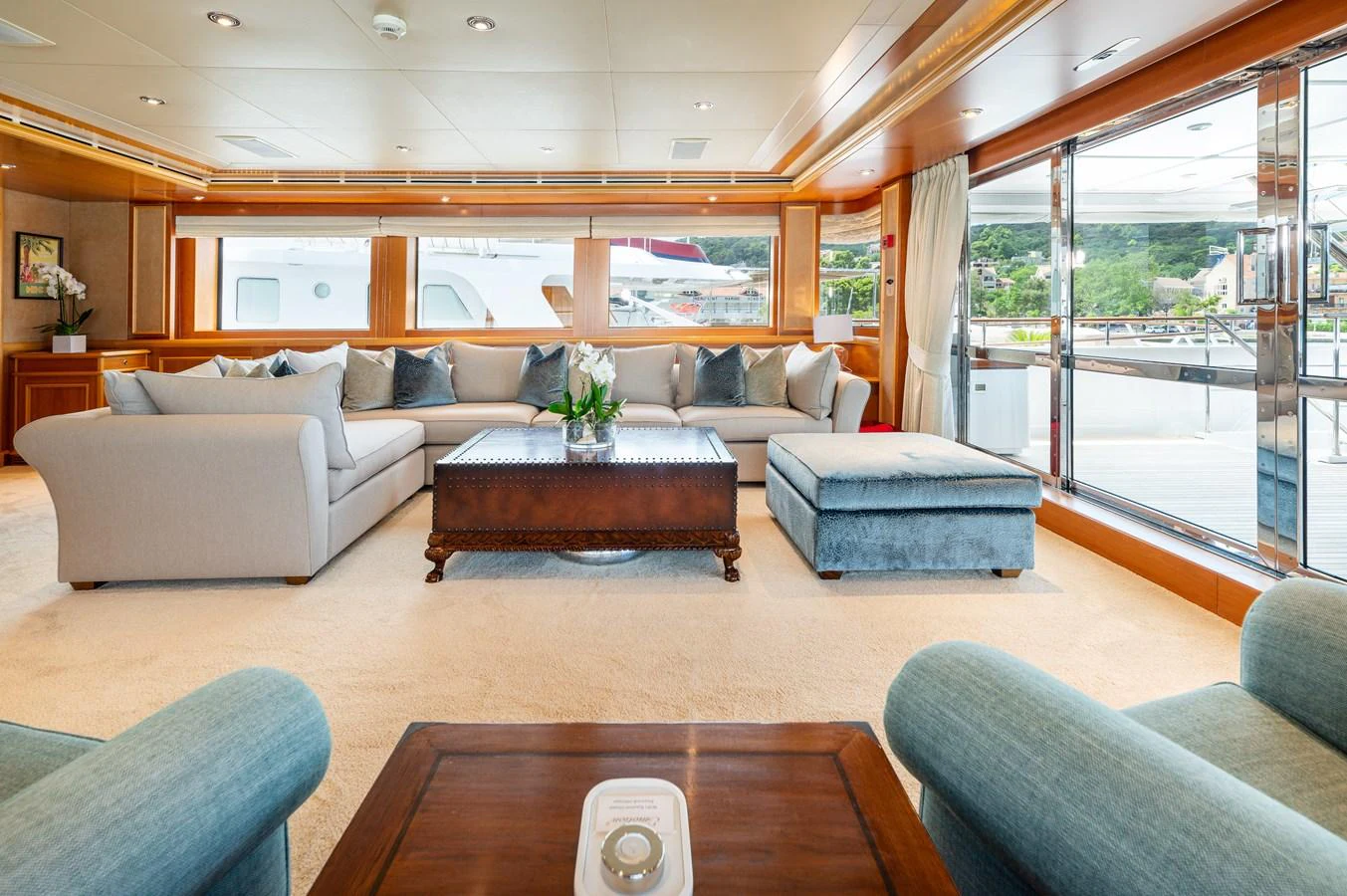 The salon features plush seating and elegant decor, offering a comfortable and stylish space for relaxation. aboard EMOTION 2 Yacht for Sale