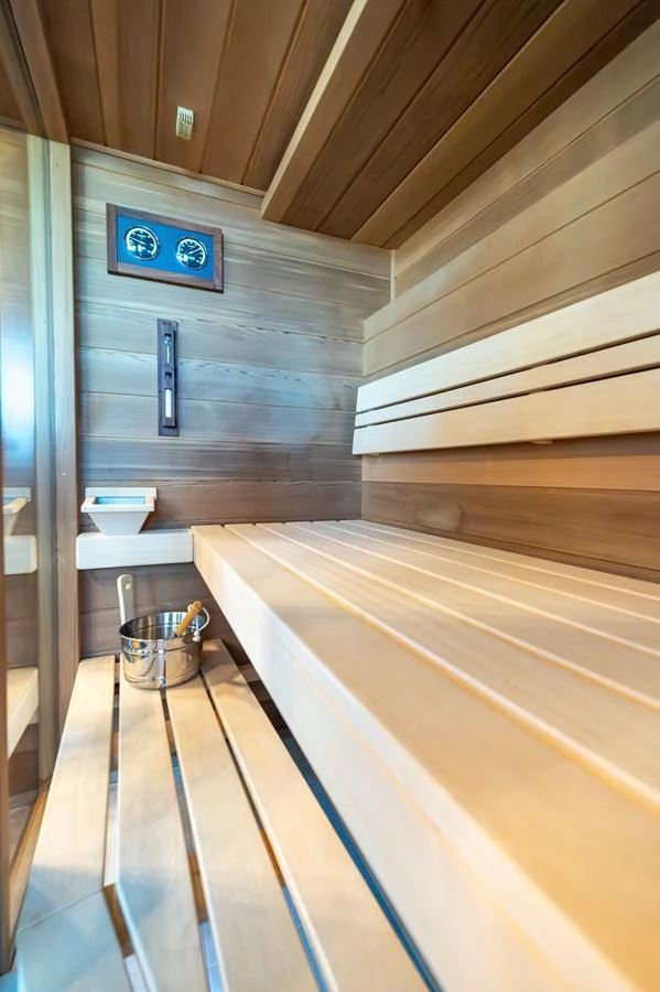 The yacht features a luxurious wooden sauna for ultimate relaxation. aboard EMOTION 2 Yacht for Sale