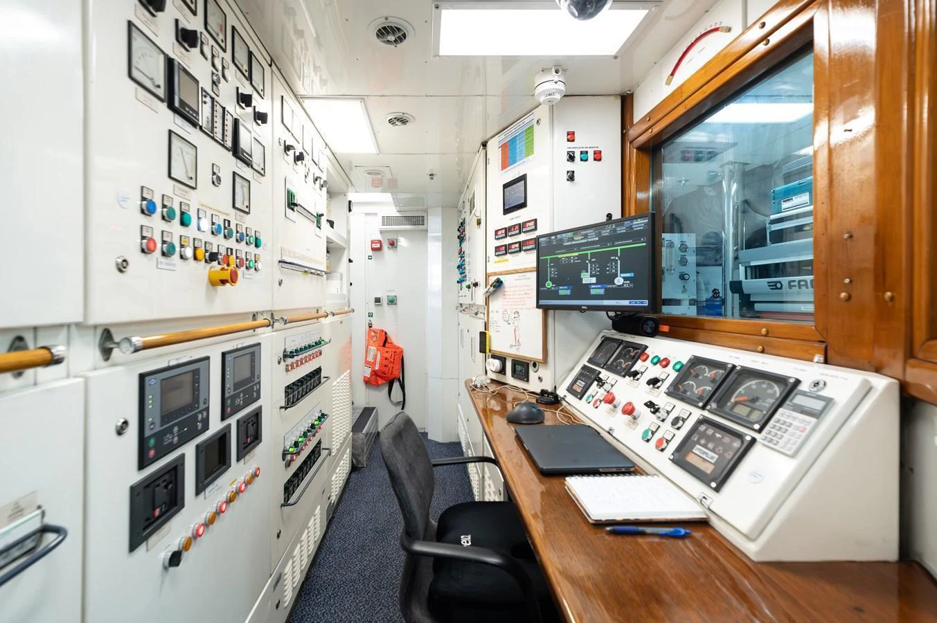 The yacht's control room is equipped with advanced monitoring systems and controls for optimal operation. aboard EMOTION 2 Yacht for Sale