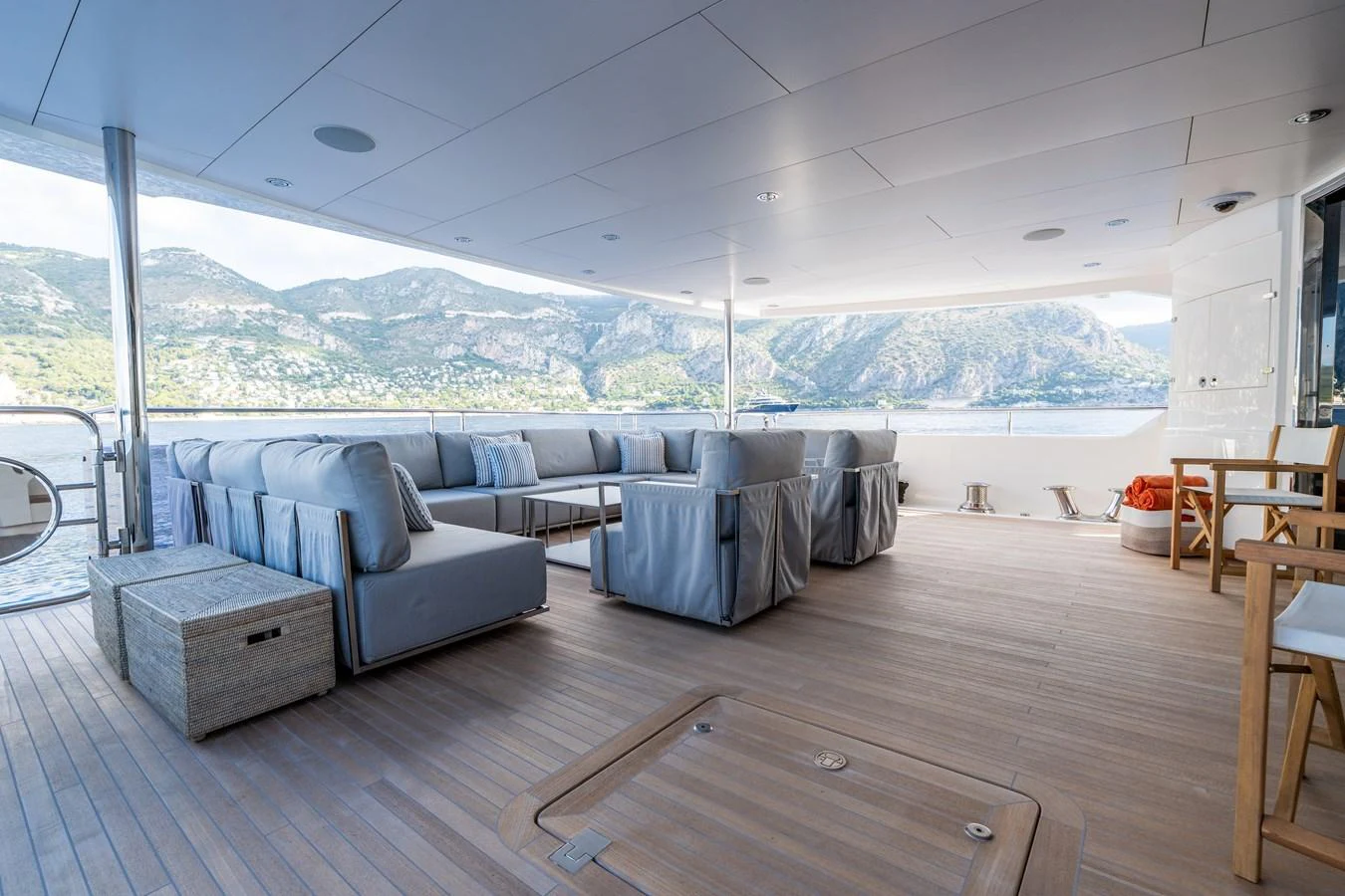 The aft deck offers a spacious and comfortable seating area with stunning views of the surrounding waters and mountains. aboard ALADDIN Yacht for Sale