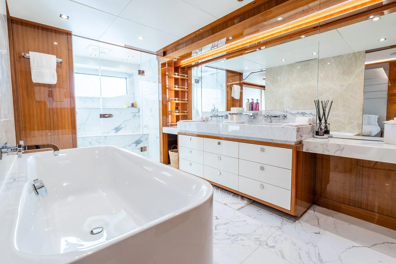The yacht's bathroom features luxurious marble finishes and modern fixtures. aboard ALADDIN Yacht for Sale