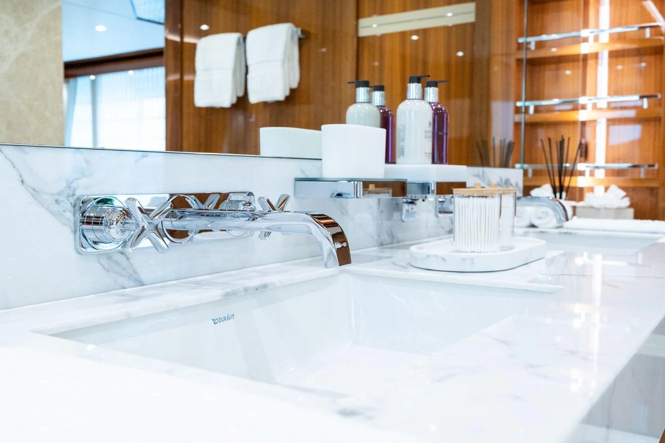 The yacht's bathroom features luxurious marble countertops and modern fixtures. aboard ALADDIN Yacht for Sale