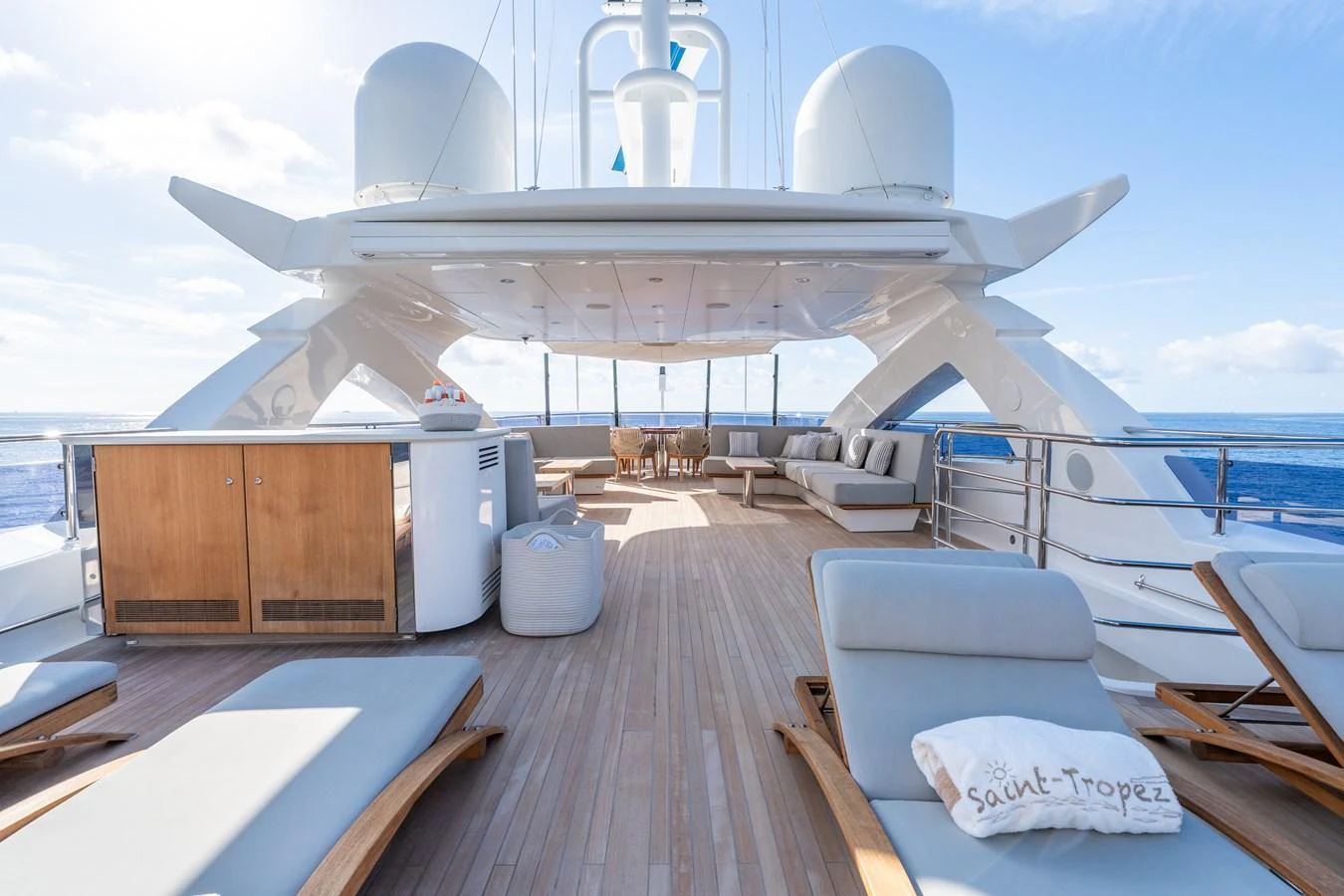 The sundeck offers a spacious and luxurious area for relaxation with ample seating and sun loungers. aboard ALADDIN Yacht for Sale
