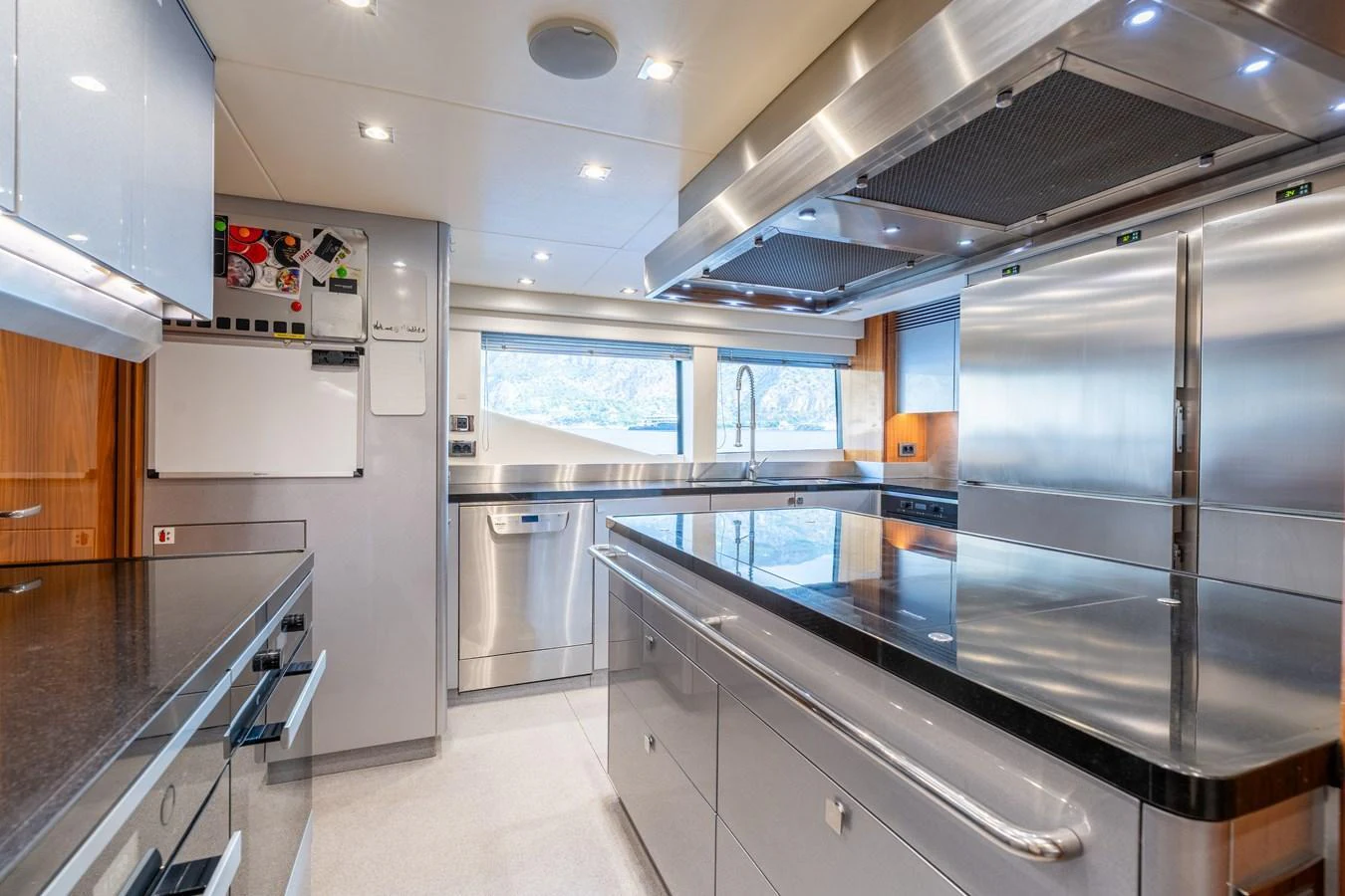 The yacht's galley is equipped with modern stainless steel appliances and ample counter space. aboard ALADDIN Yacht for Sale