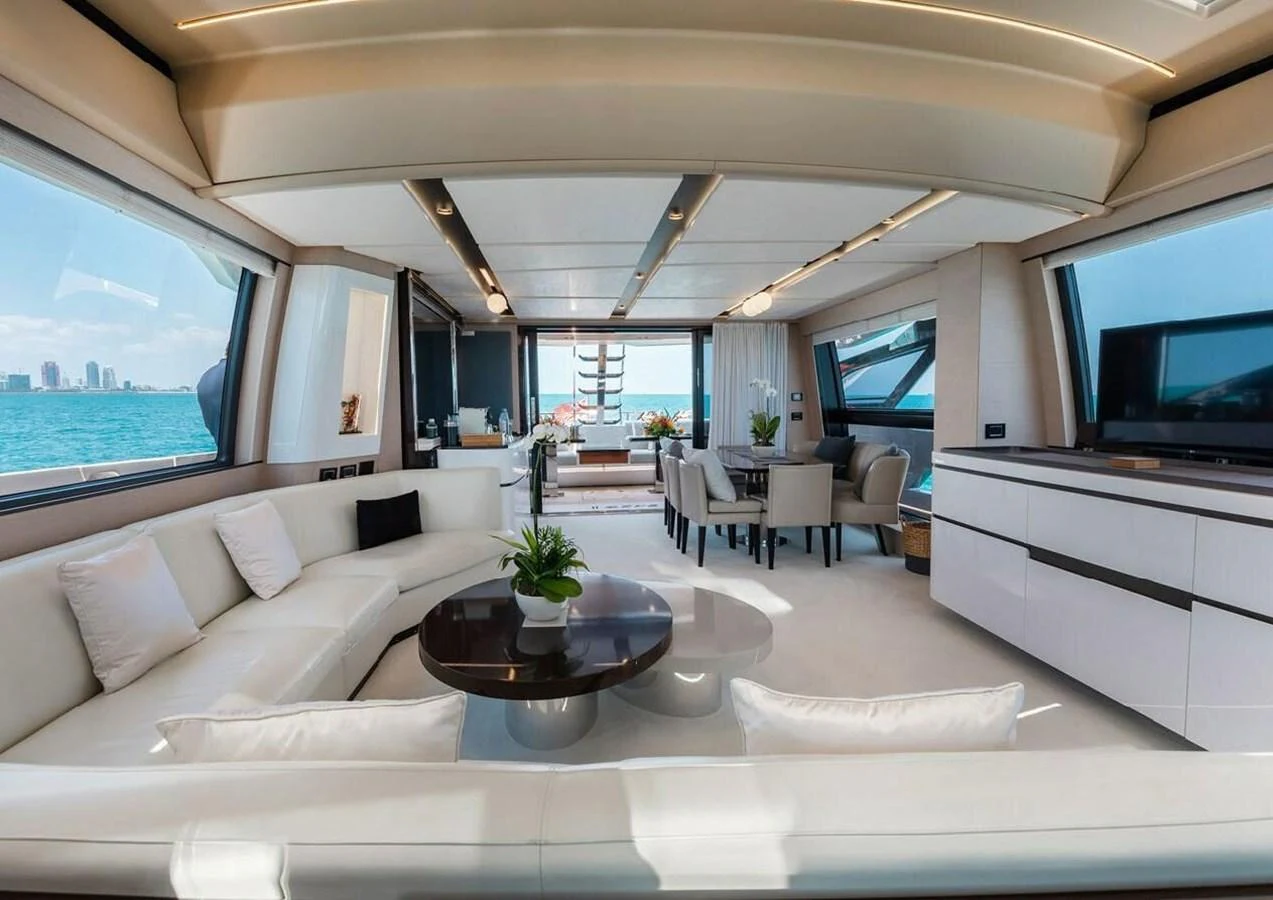 The salon features a spacious and luxurious seating area with panoramic windows offering stunning ocean views. aboard LANCE WEST Yacht for Sale