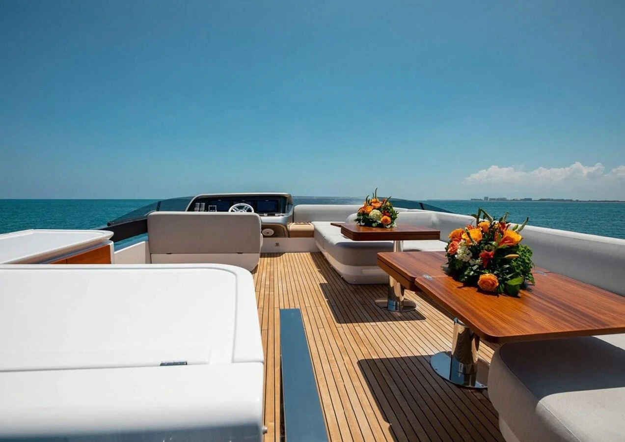The flybridge offers a spacious and elegant outdoor seating area with beautiful ocean views. aboard LANCE WEST Yacht for Sale
