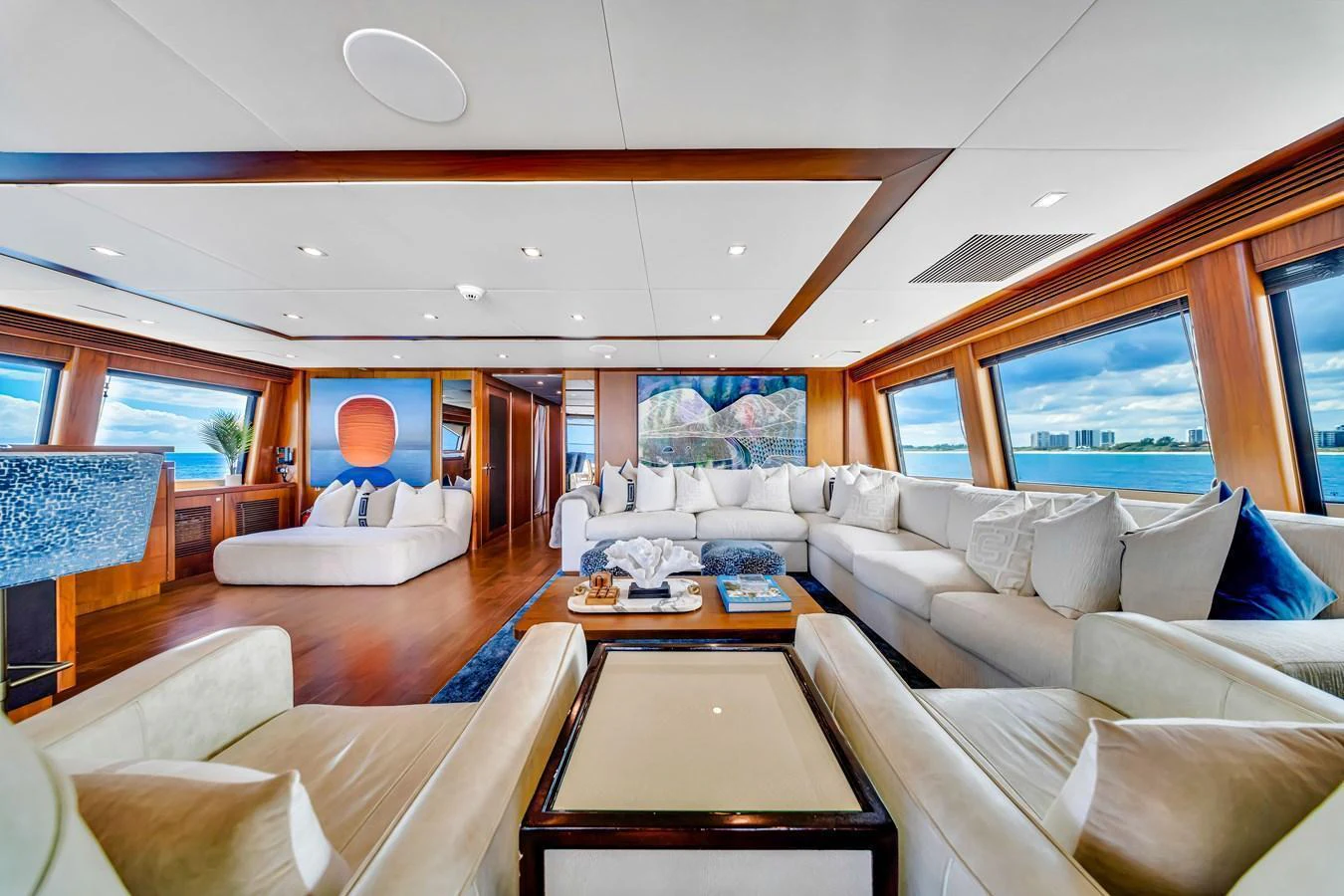 The spacious salon features luxurious seating with panoramic views of the ocean. aboard NATURAL 9 Yacht for Sale