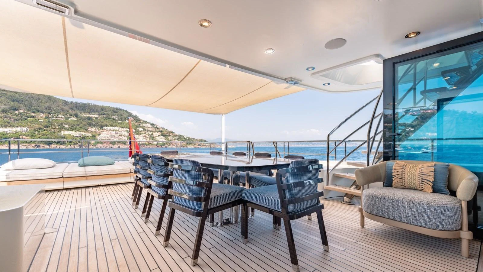 The aft deck offers a spacious and inviting area for alfresco dining with stunning views. aboard KOKORO Yacht for Sale
