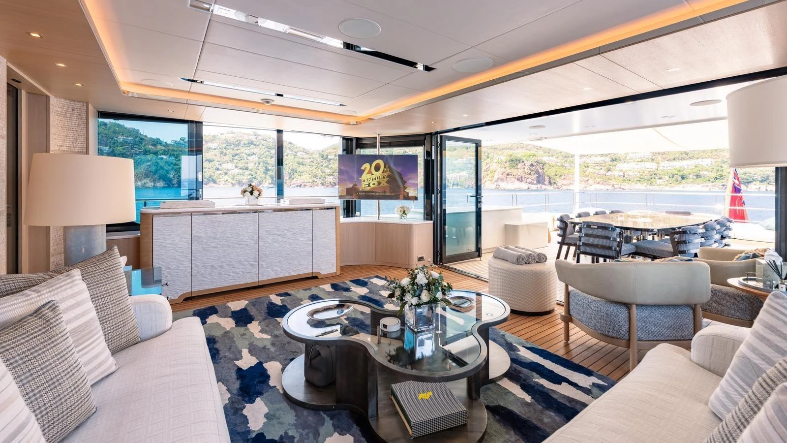 The spacious salon offers a luxurious and comfortable setting with panoramic views. aboard KOKORO Yacht for Sale