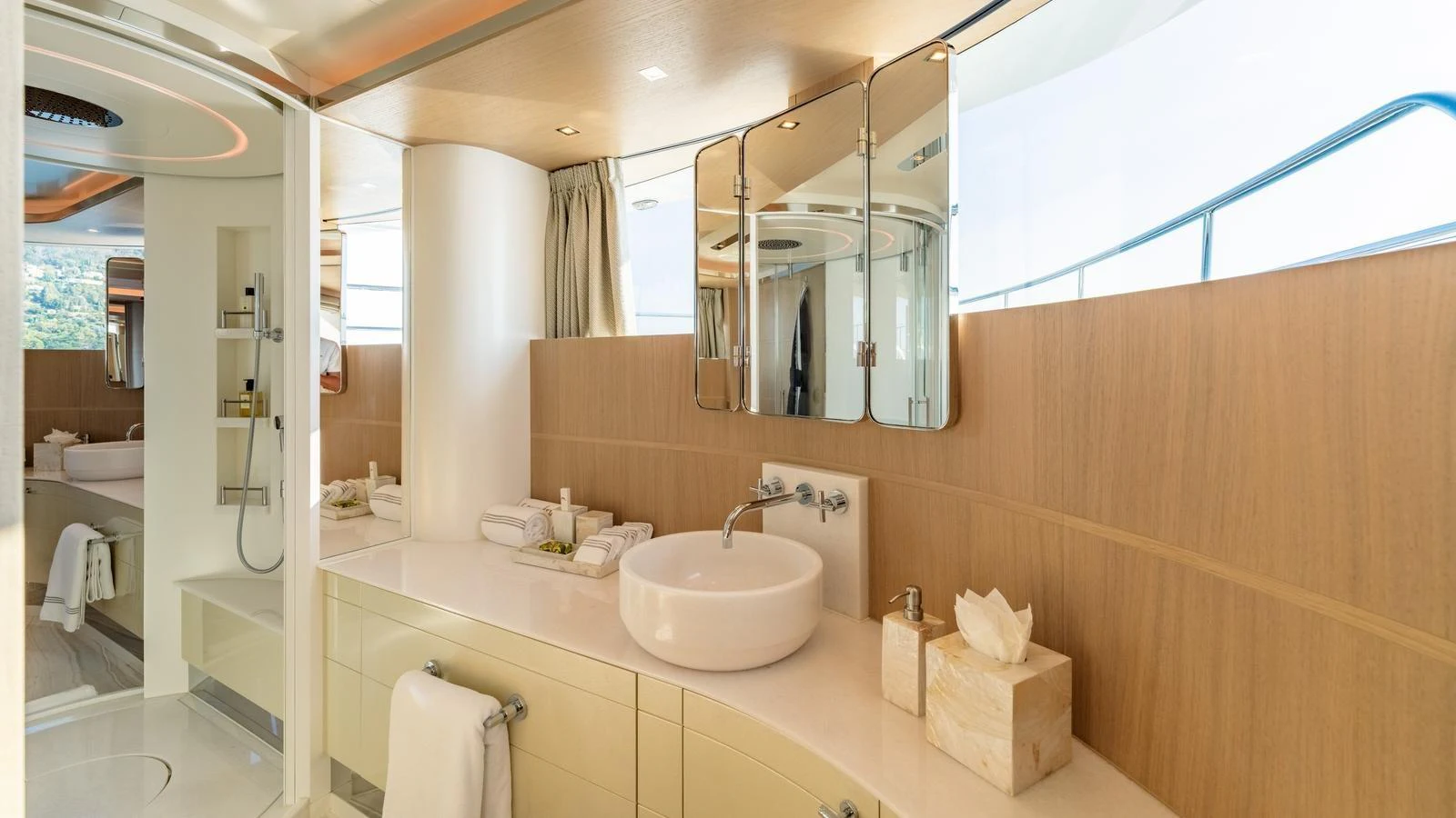 The yacht's bathroom features a modern design with a spacious vanity and elegant fixtures. aboard KOKORO Yacht for Sale