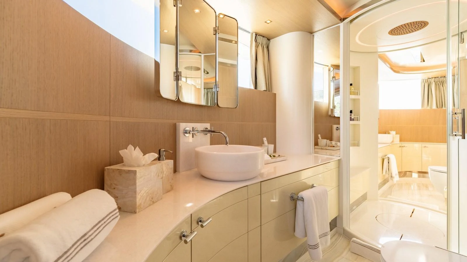 This luxurious yacht bathroom features elegant fixtures and a spacious layout. aboard KOKORO Yacht for Sale
