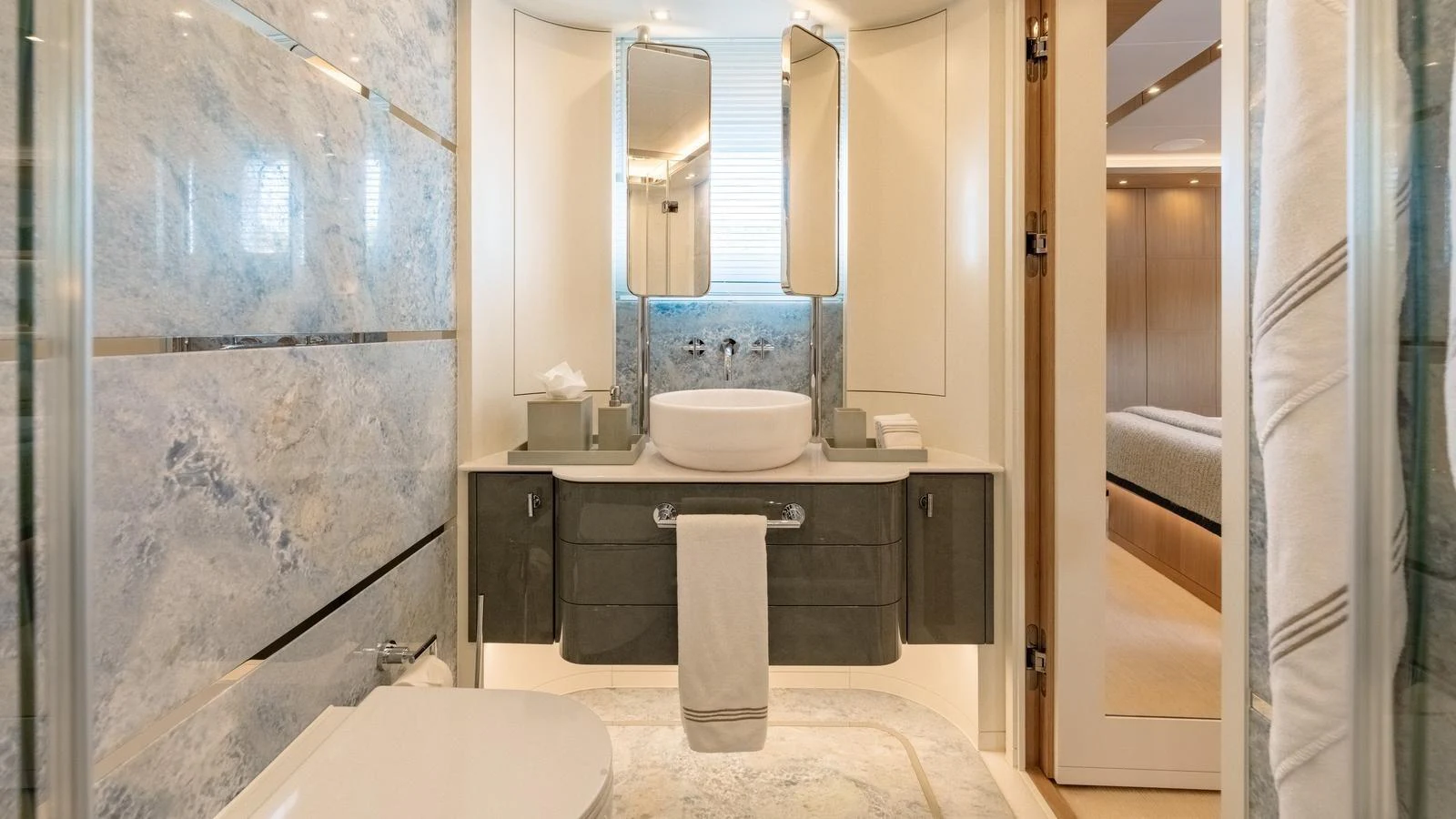 A luxurious yacht bathroom featuring modern fixtures and elegant design. aboard KOKORO Yacht for Sale