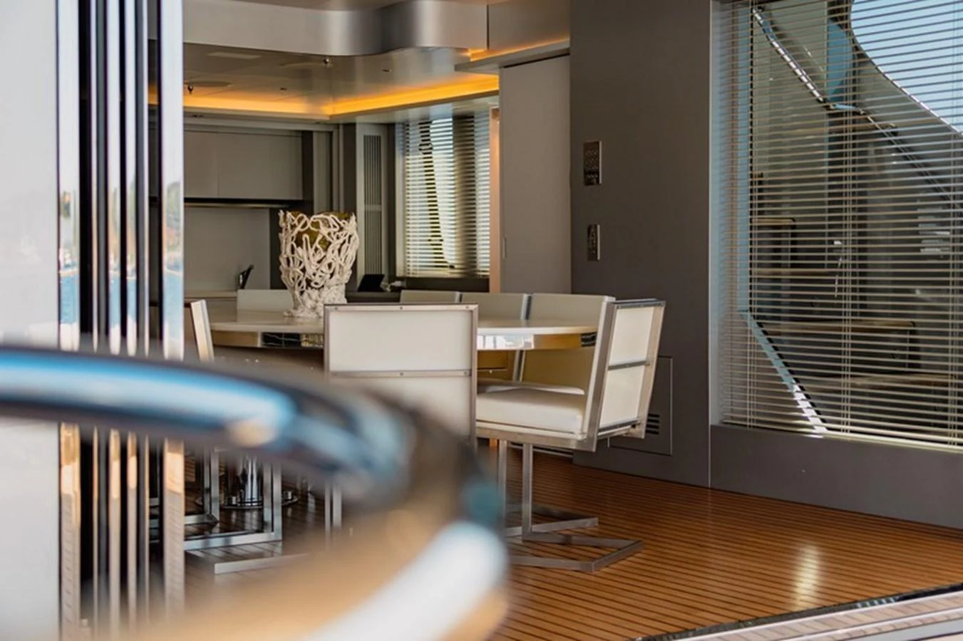 The yacht's interior features a modern dining area with sleek furnishings and elegant decor. aboard ANTALIS Yacht for Sale