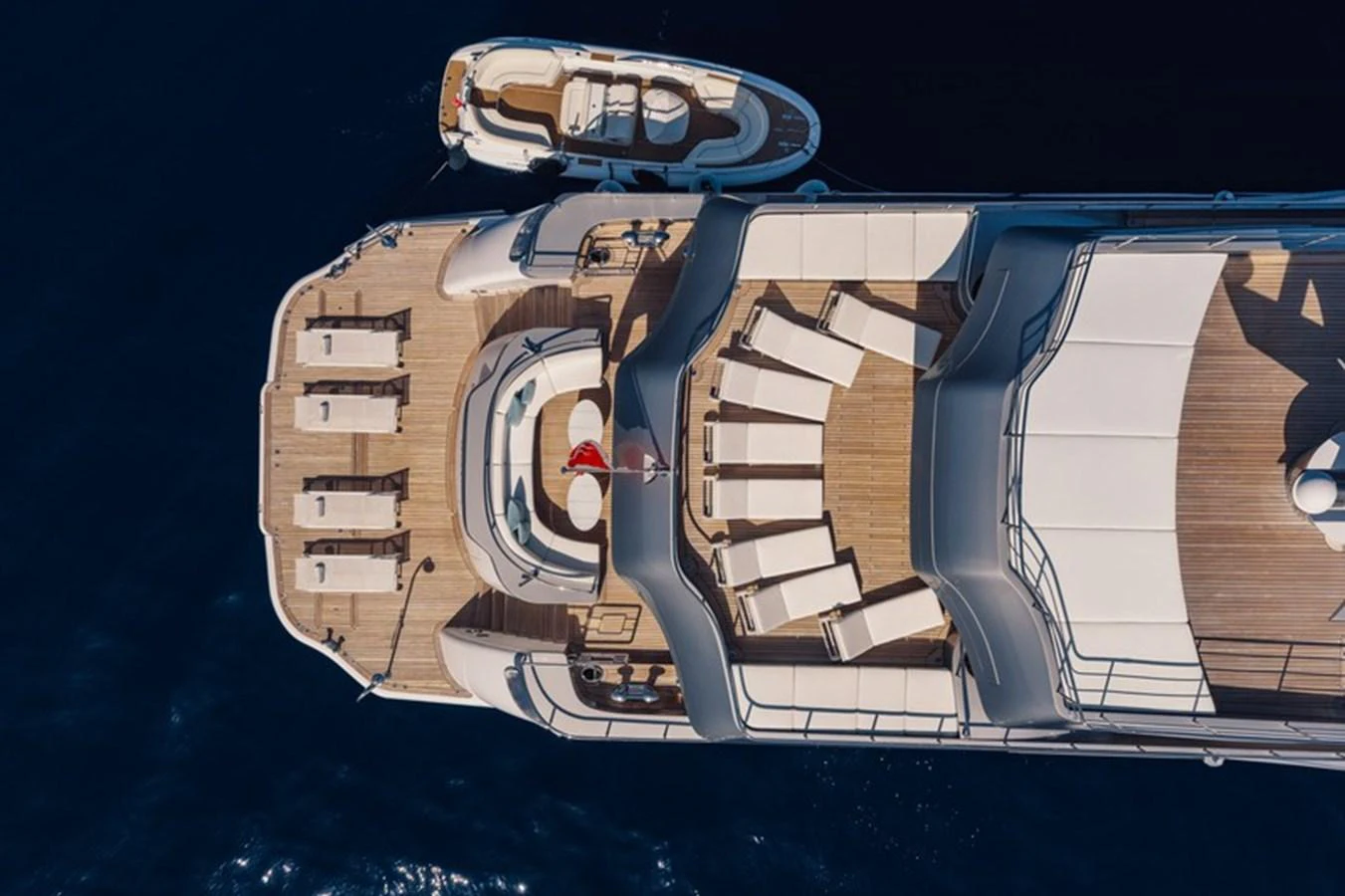 The sundeck offers ample lounging space with sunbeds and a jacuzzi, perfect for relaxation. aboard ANTALIS Yacht for Sale