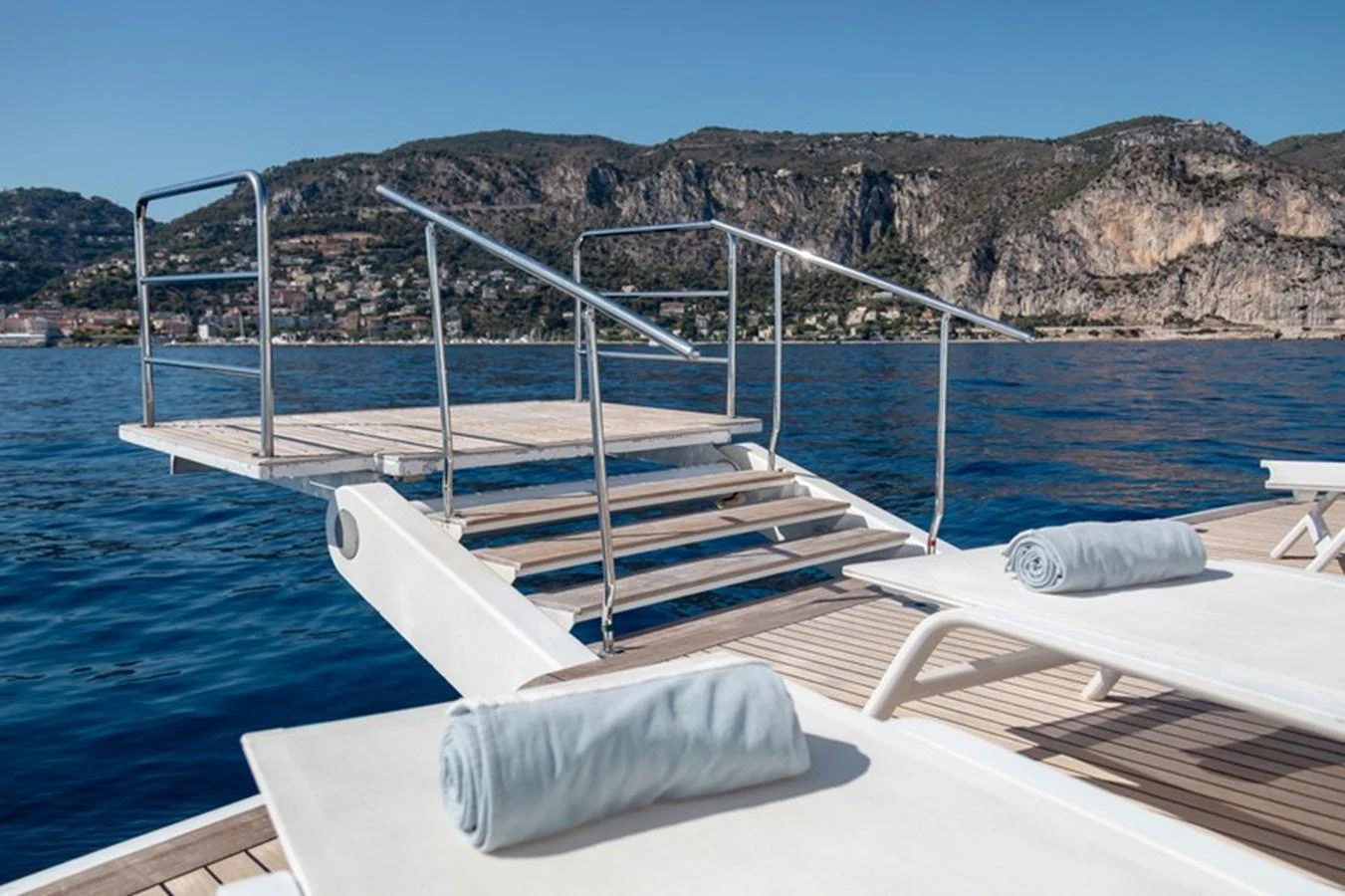 This image showcases a luxurious swim platform with steps leading into the water, perfect for easy access to the sea. aboard ANTALIS Yacht for Sale