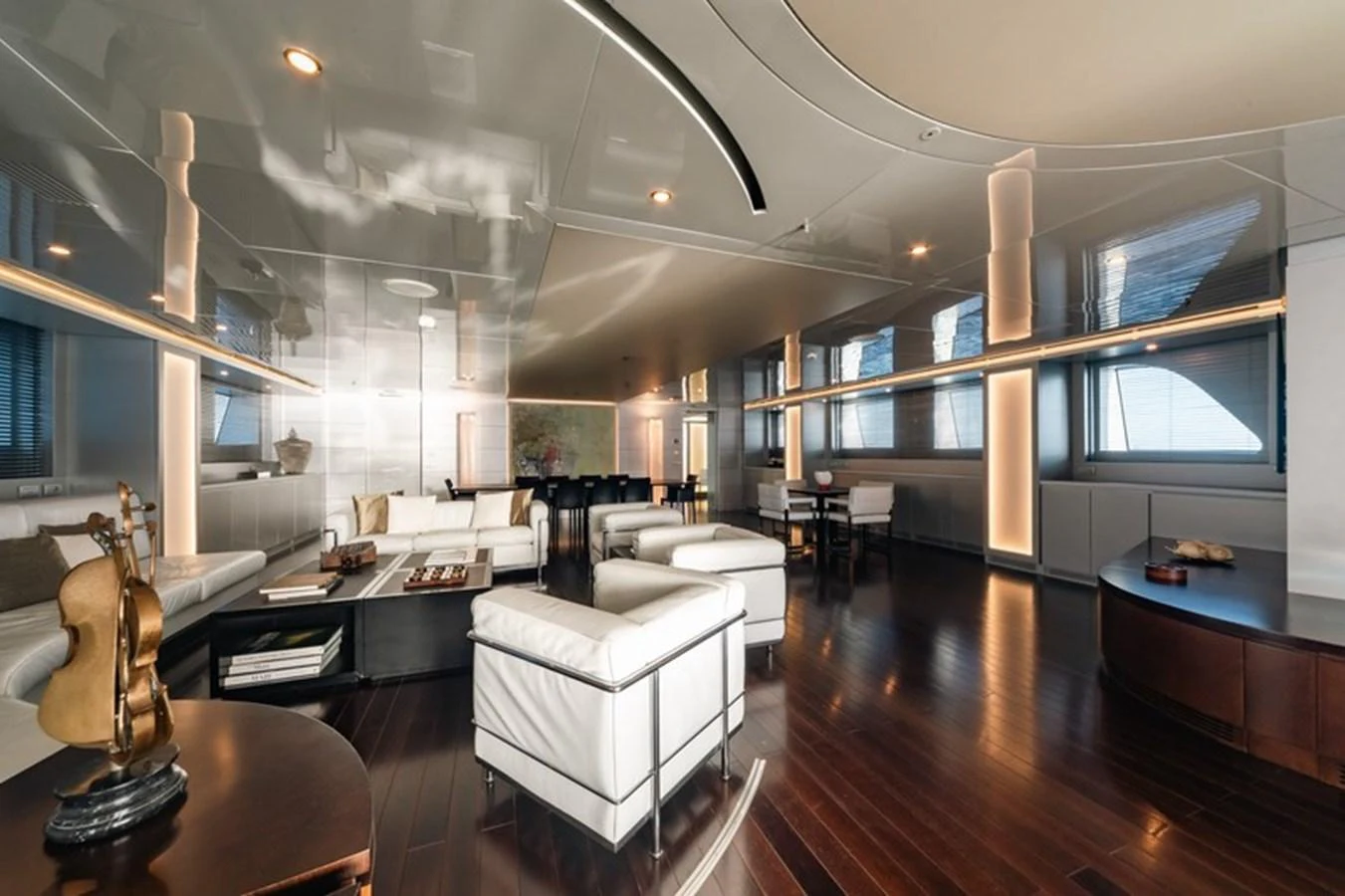 The yacht's interior features a spacious and modern lounge area with luxurious seating and elegant decor. aboard ANTALIS Yacht for Sale