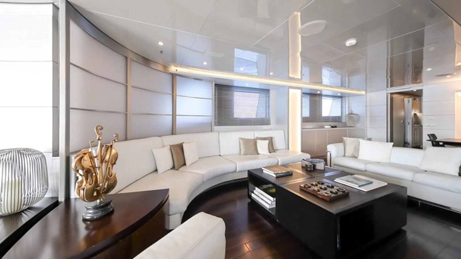 The salon features a spacious and modern seating area with elegant decor and ample natural light. aboard ANTALIS Yacht for Sale