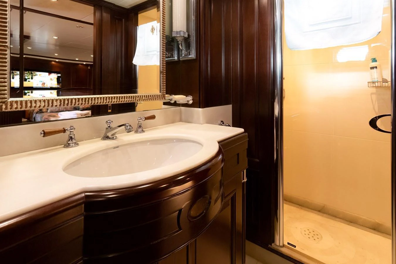 The yacht's bathroom features a luxurious sink and a spacious shower area. aboard ANYPA Yacht for Sale