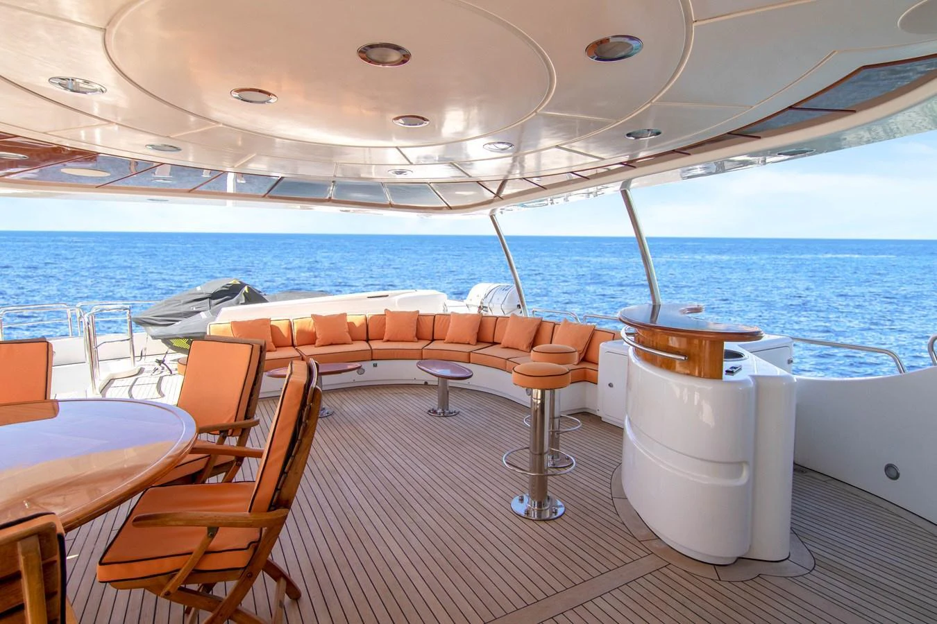 The aft deck features a spacious seating area with a panoramic ocean view. aboard ANYPA Yacht for Sale