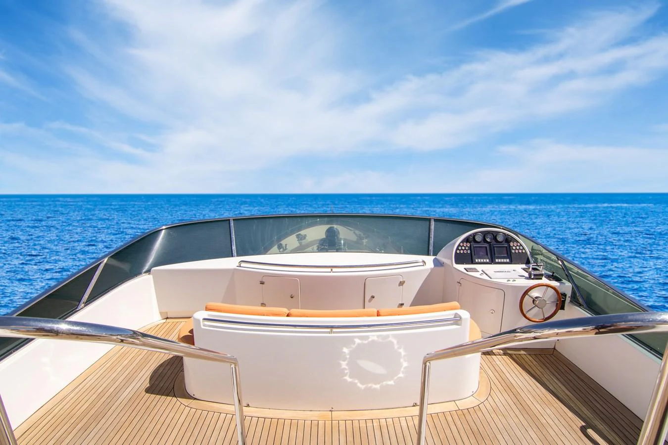The flybridge offers a stunning panoramic view of the open sea, complemented by a sleek helm station and comfortable seating. aboard ANYPA Yacht for Sale