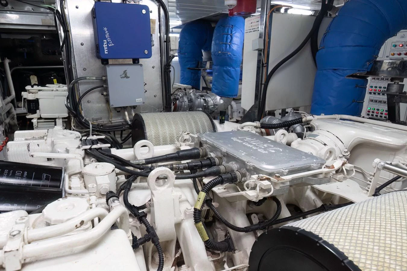 The image showcases the yacht's engine room with various mechanical components and equipment. aboard ANYPA Yacht for Sale