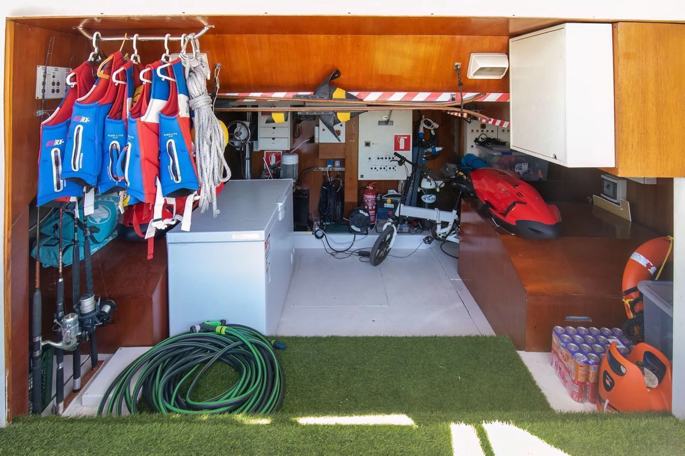 The yacht's storage area is well-equipped with various water sports gear and safety equipment. aboard ANYPA Yacht for Sale