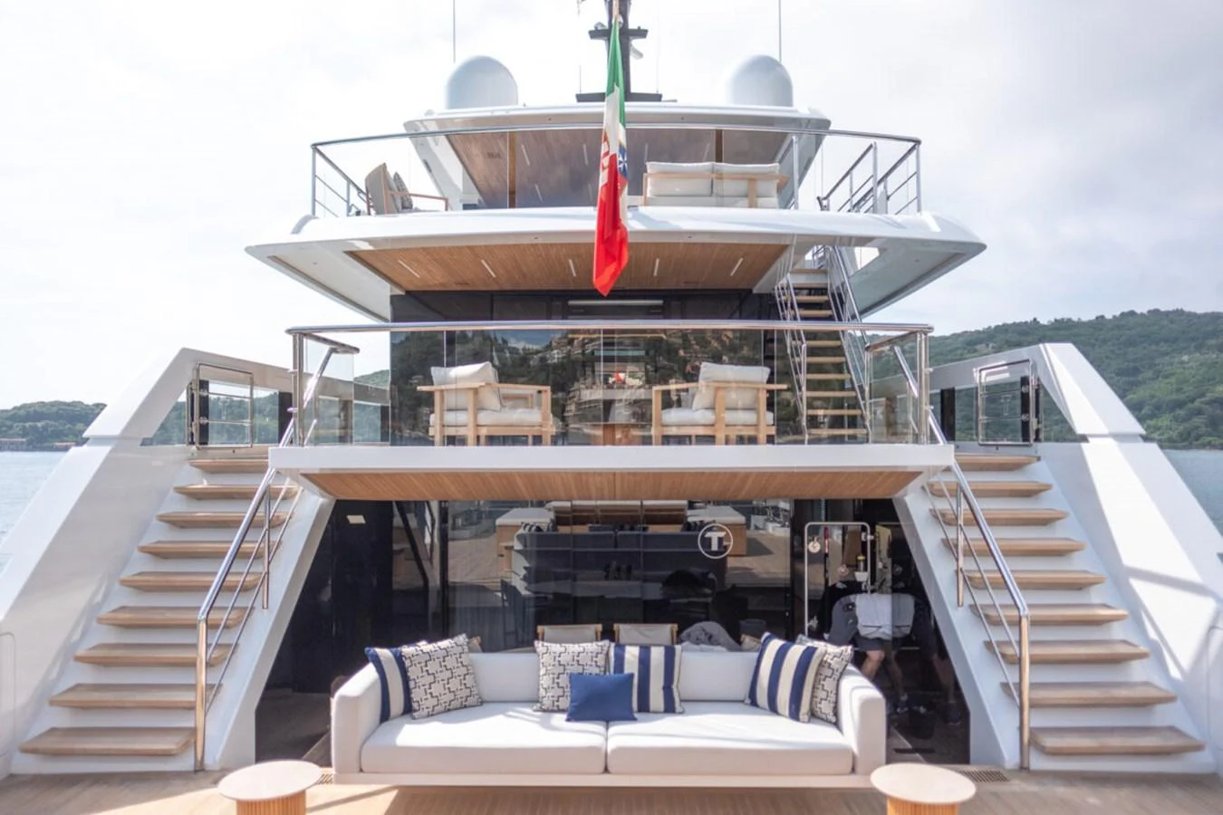 The yacht's aft deck features elegant seating areas and a sophisticated design, perfect for relaxation and socializing. aboard TOLEMAI Yacht for Sale