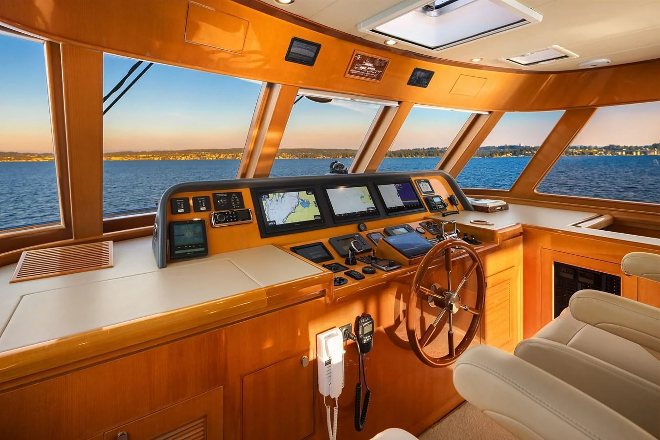 The helm station offers a commanding view with state-of-the-art navigation equipment and luxurious seating. aboard LA BELLA VITA II Yacht for Sale