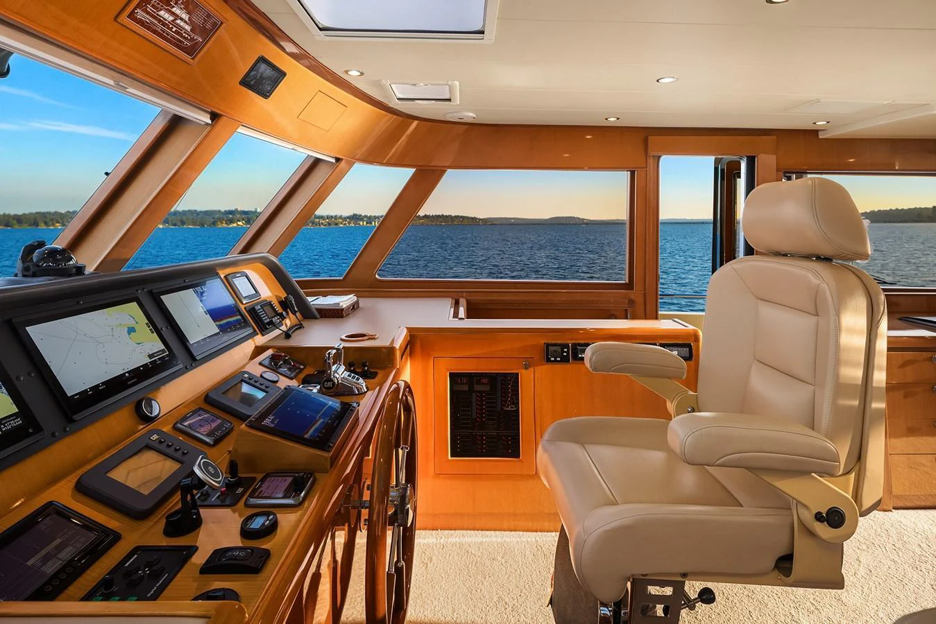 The helm station offers a commanding view with state-of-the-art navigation equipment and luxurious seating. aboard LA BELLA VITA II Yacht for Sale