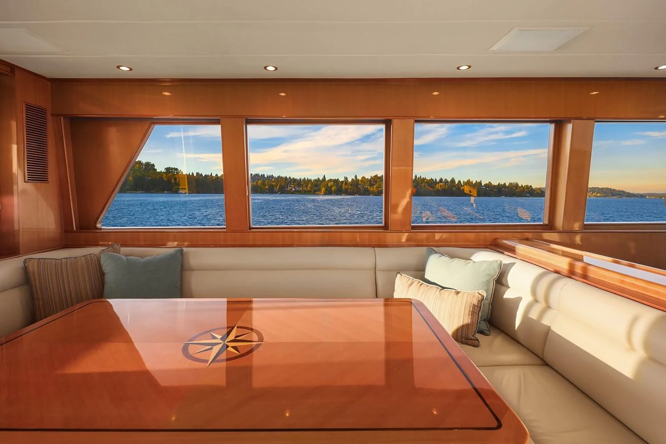 The salon features large windows offering stunning views and ample natural light. aboard LA BELLA VITA II Yacht for Sale
