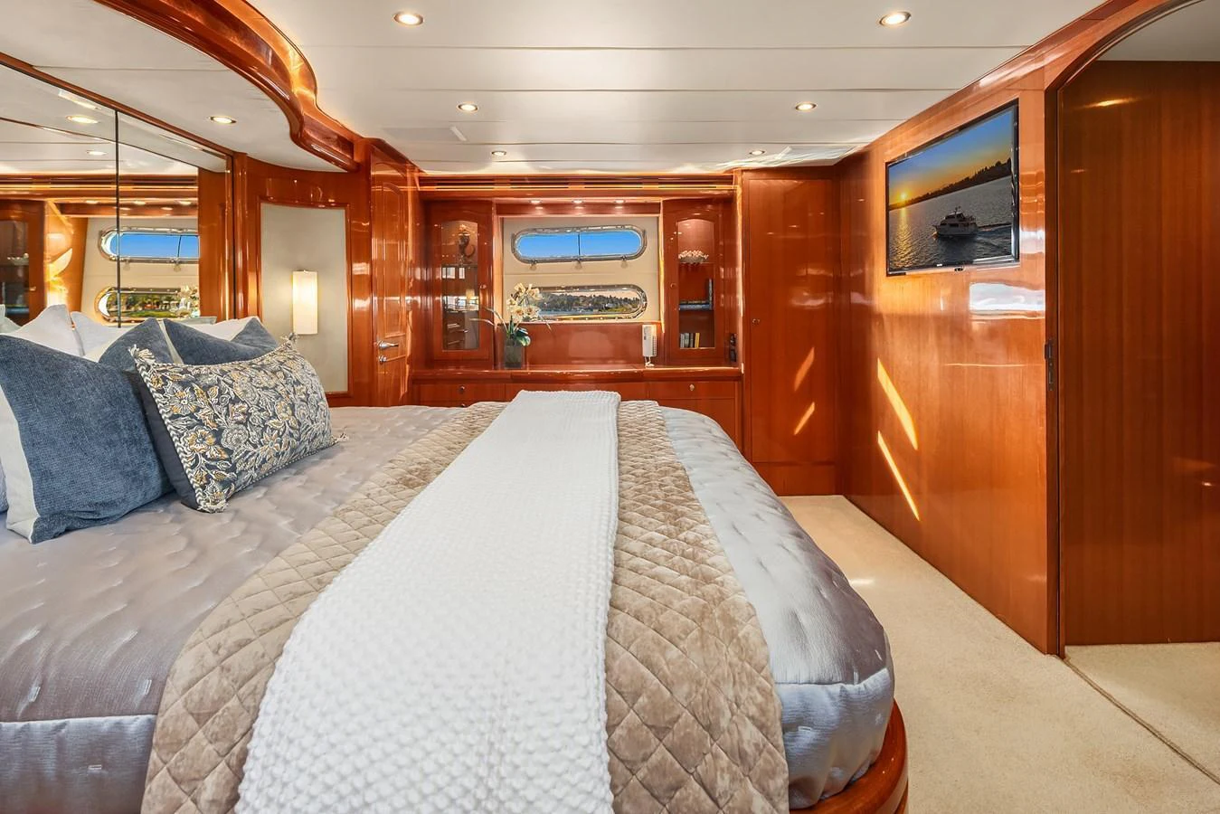 The master stateroom exudes luxury with its plush bedding and warm wood finishes. aboard LA BELLA VITA II Yacht for Sale