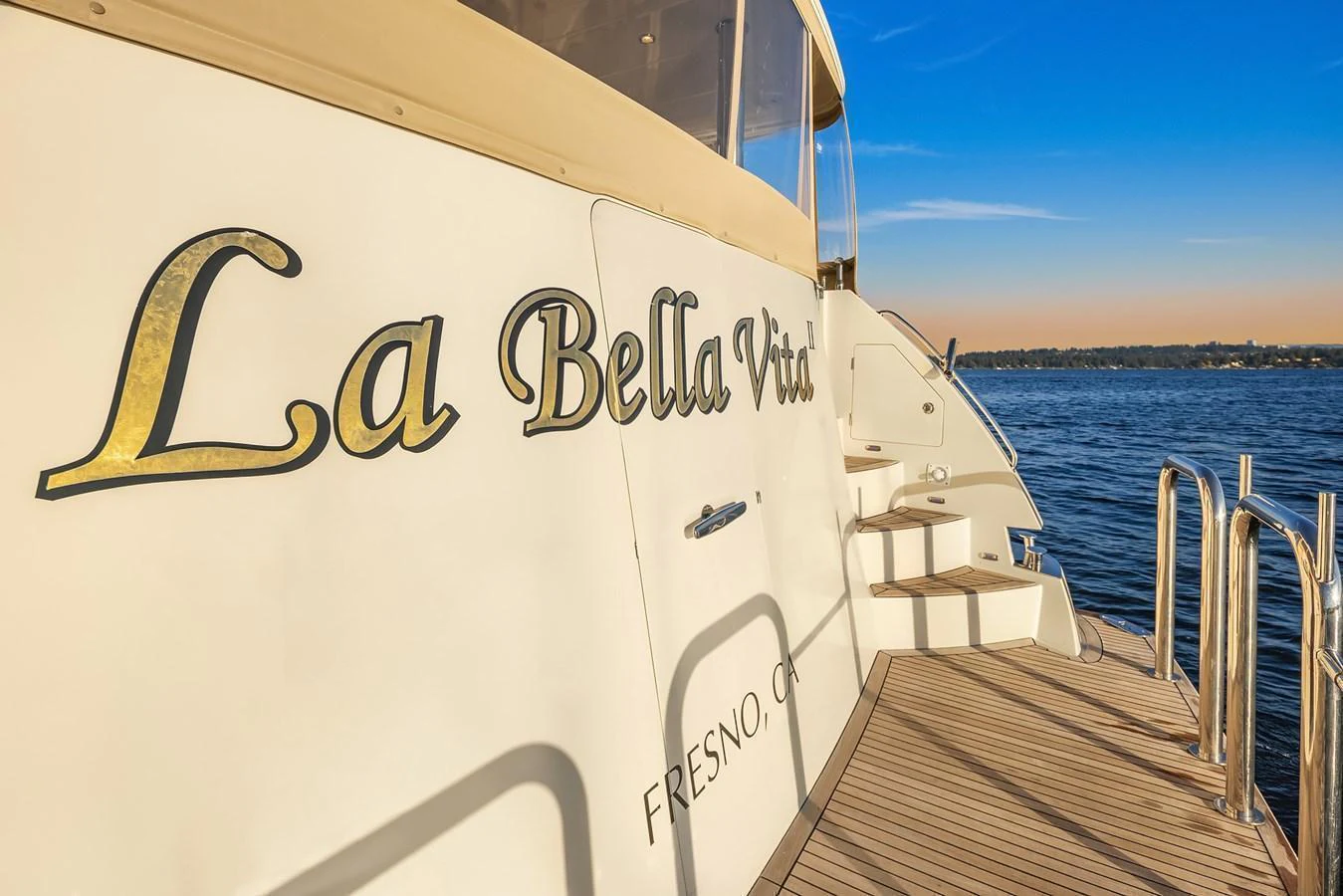 The aft deck of the yacht offers a serene view of the water, perfect for relaxation. aboard LA BELLA VITA II Yacht for Sale