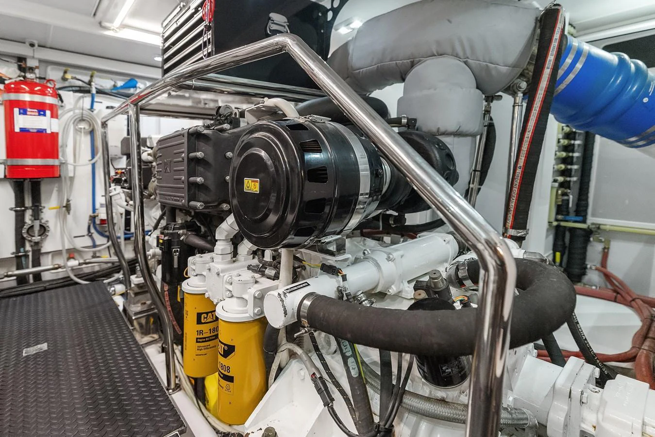 The image showcases the yacht's well-maintained engine room with visible machinery and equipment. aboard LA BELLA VITA II Yacht for Sale