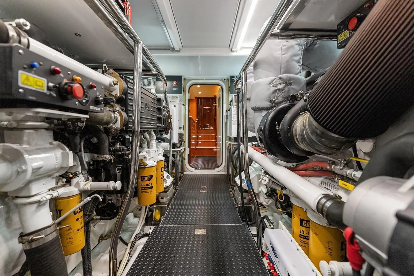 The image showcases the well-maintained engine room of the yacht, highlighting its advanced machinery and equipment. aboard LA BELLA VITA II Yacht for Sale