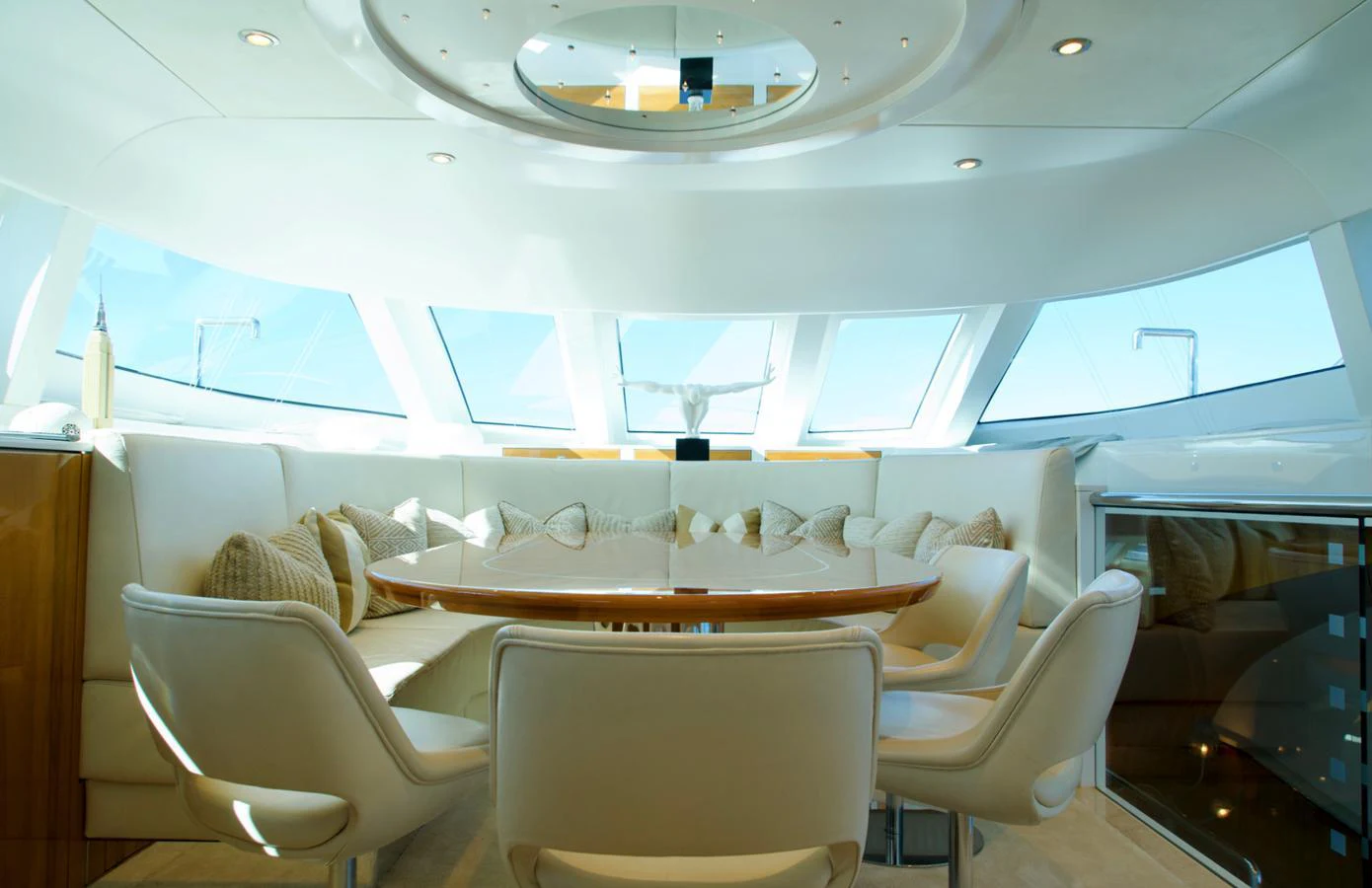 The salon features a luxurious seating area with panoramic windows and modern furnishings. aboard SEA BREEZE ONE Yacht for Sale