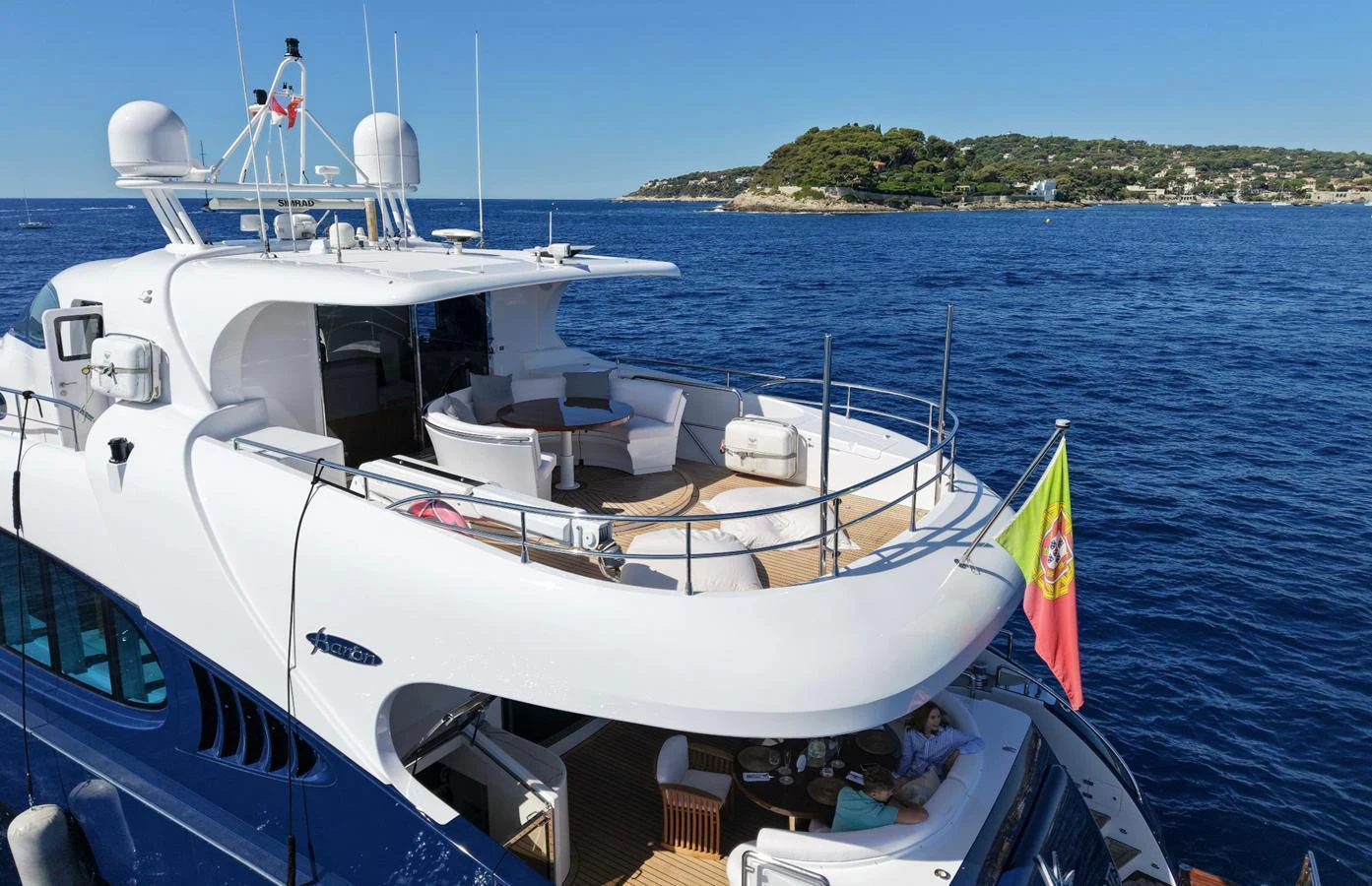 The yacht's aft deck offers a spacious and inviting area for relaxation and socializing, with stunning views of the surrounding waters. aboard SEA BREEZE ONE Yacht for Sale